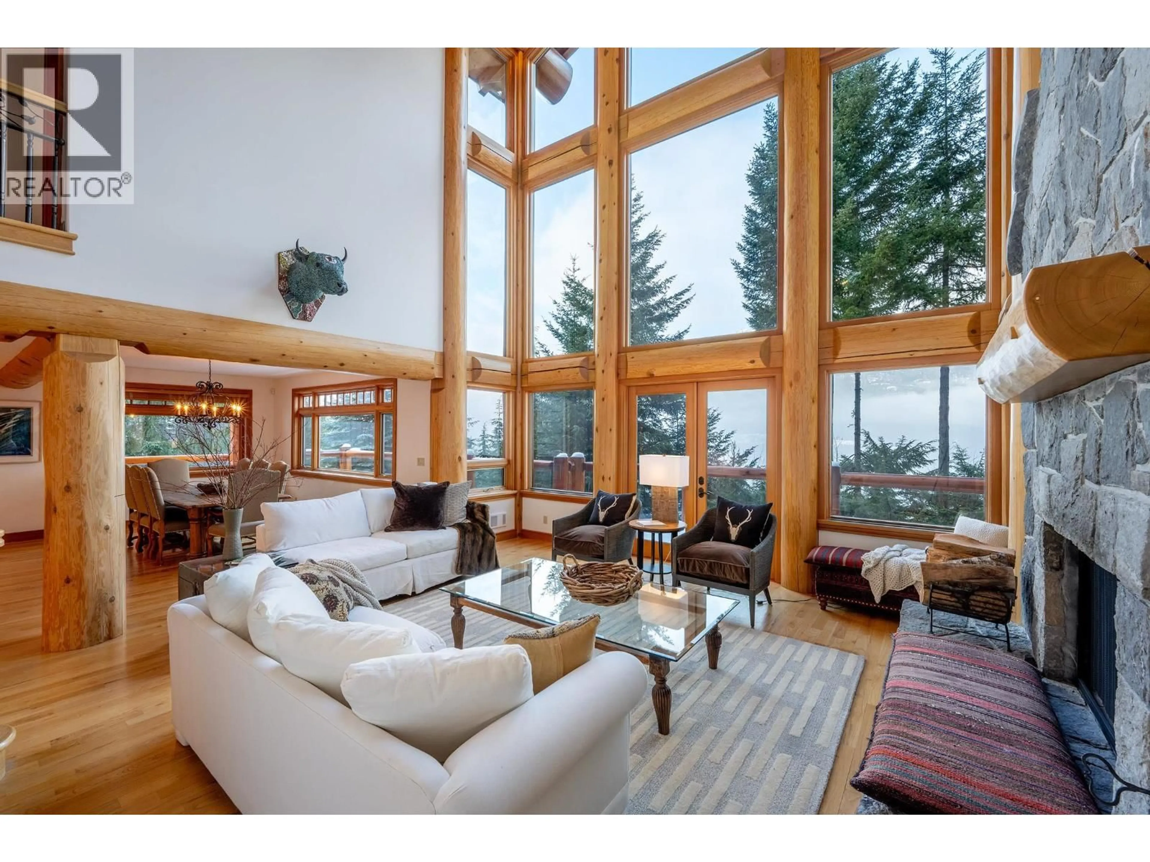 Living room with furniture, wood/laminate floor for 3826 SUNRIDGE DRIVE, Whistler British Columbia V8E0W1
