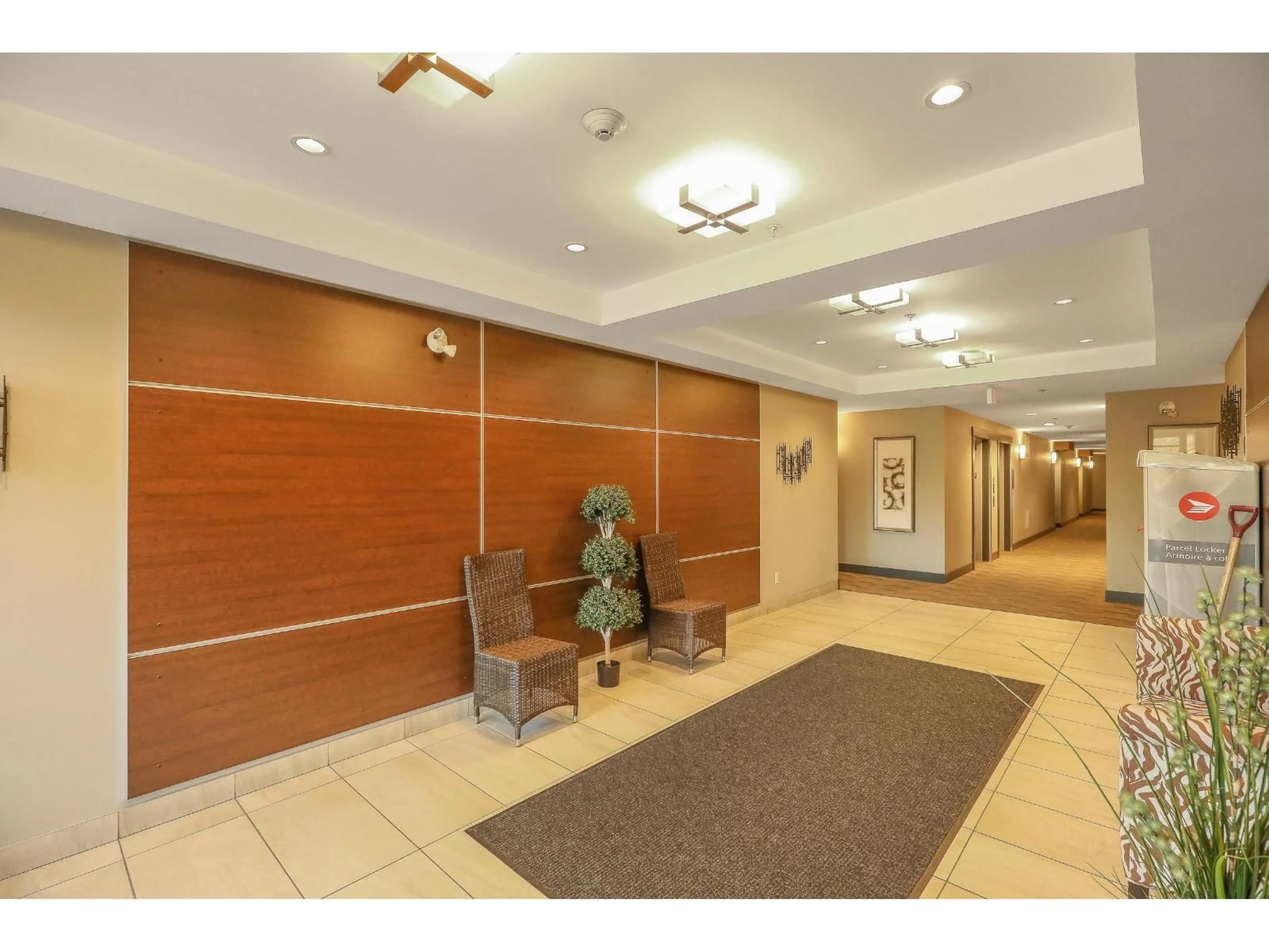 Indoor foyer for 209 - 19936 56 AVENUE, Langley British Columbia V3A3X9