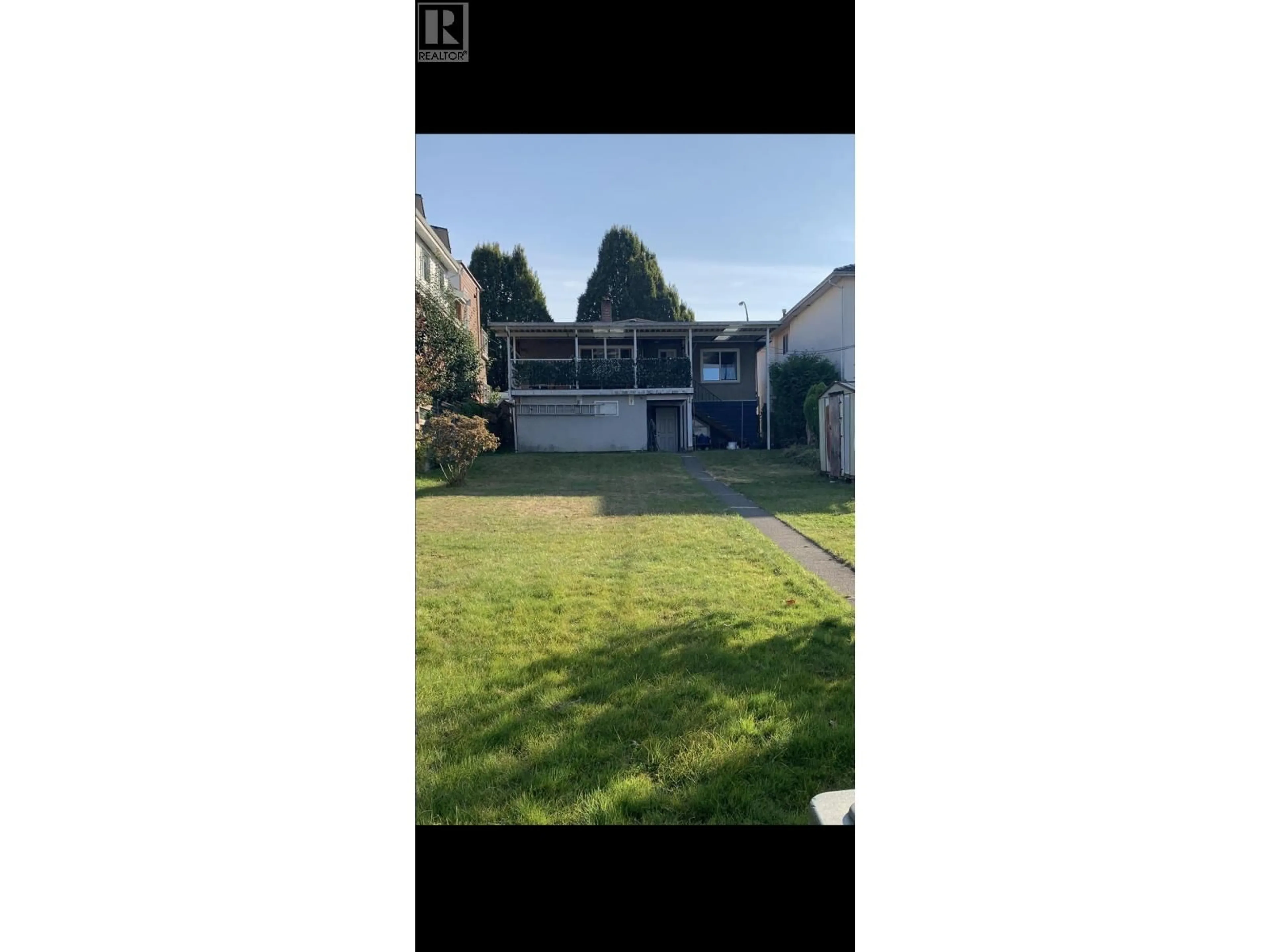 A pic from outside/outdoor area/front of a property/back of a property/a pic from drone, street for 1723 33RD AVENUE, Vancouver British Columbia V5N3E3