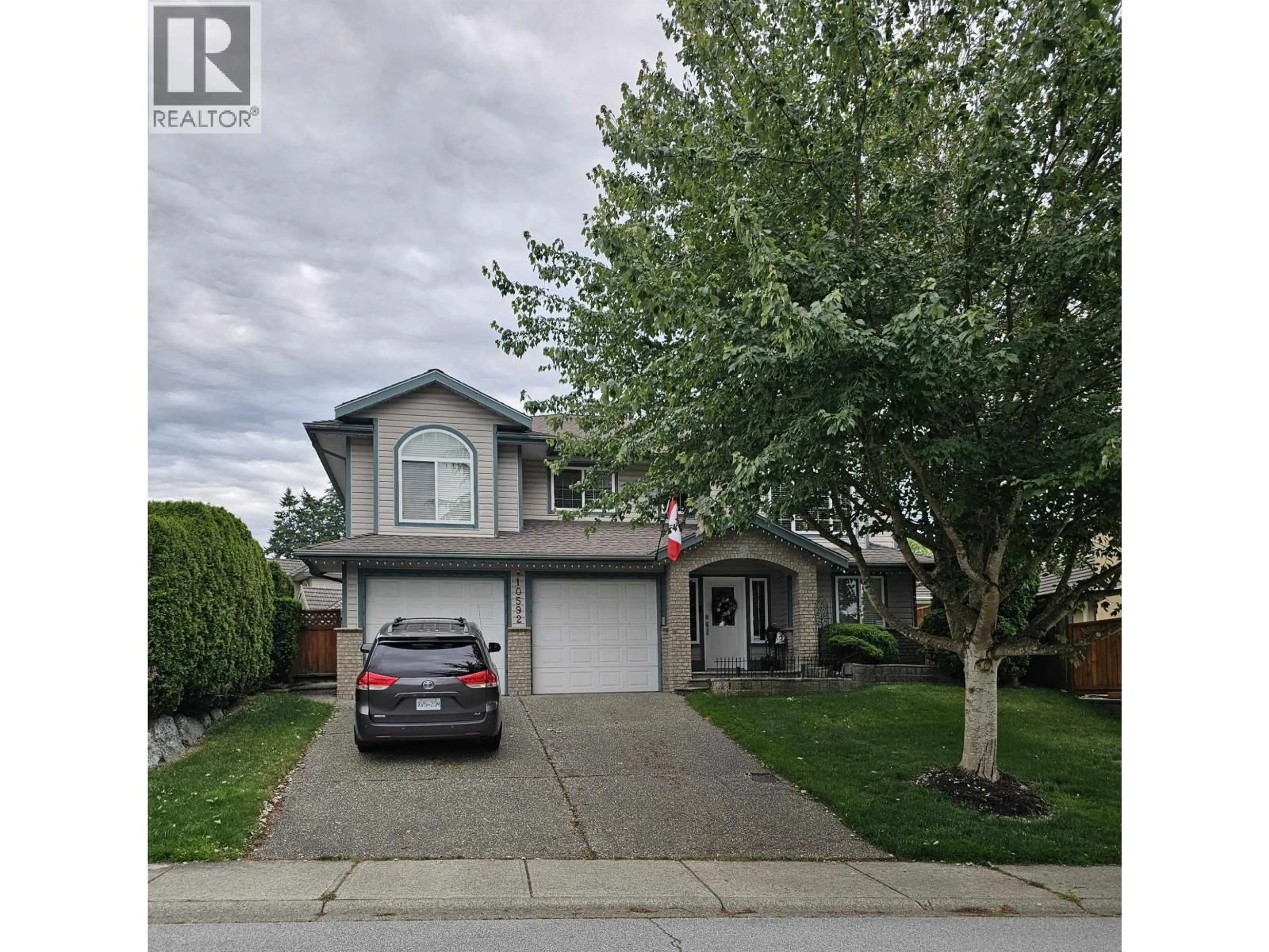 Home with vinyl exterior material, street for 10592 238A STREET, Maple Ridge British Columbia V2W1E4