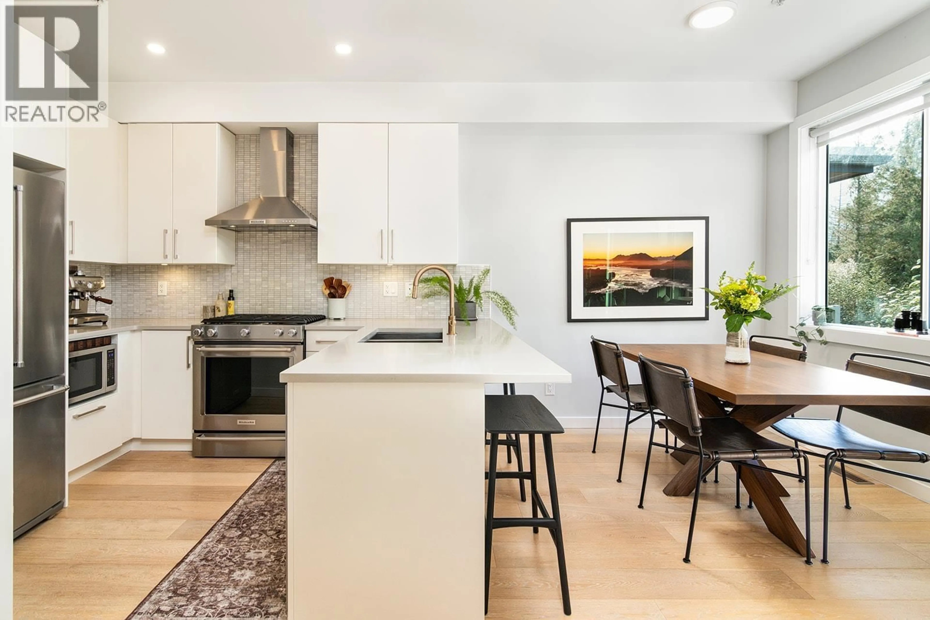 Open concept kitchen, wood/laminate floor for 6 - 41360 SKYRIDGE PLACE, Squamish British Columbia V8B0Y6