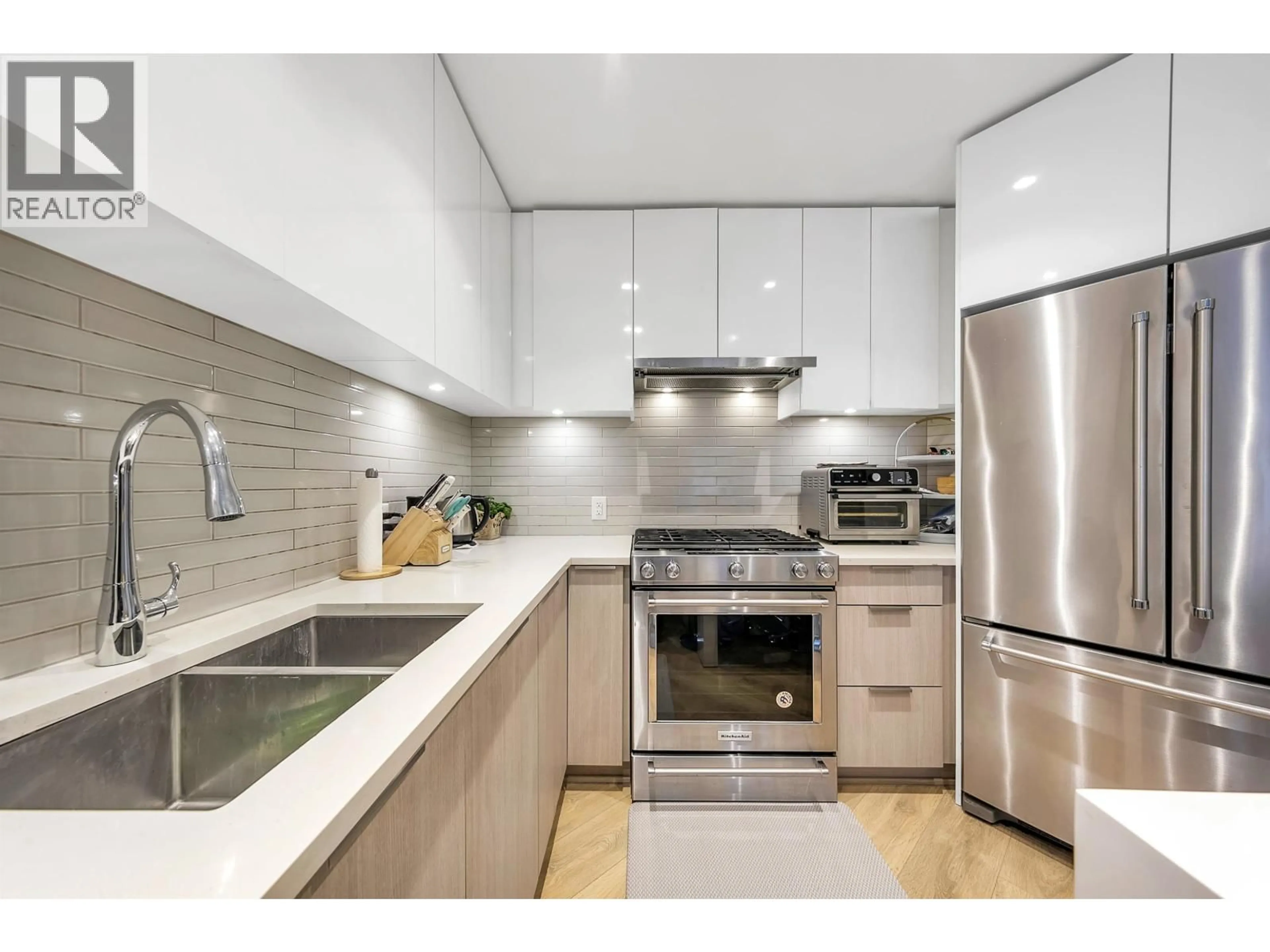 Contemporary kitchen, ceramic/tile floor for 413 - 3588 SAWMILL CRESCENT, Vancouver British Columbia V5S0H5