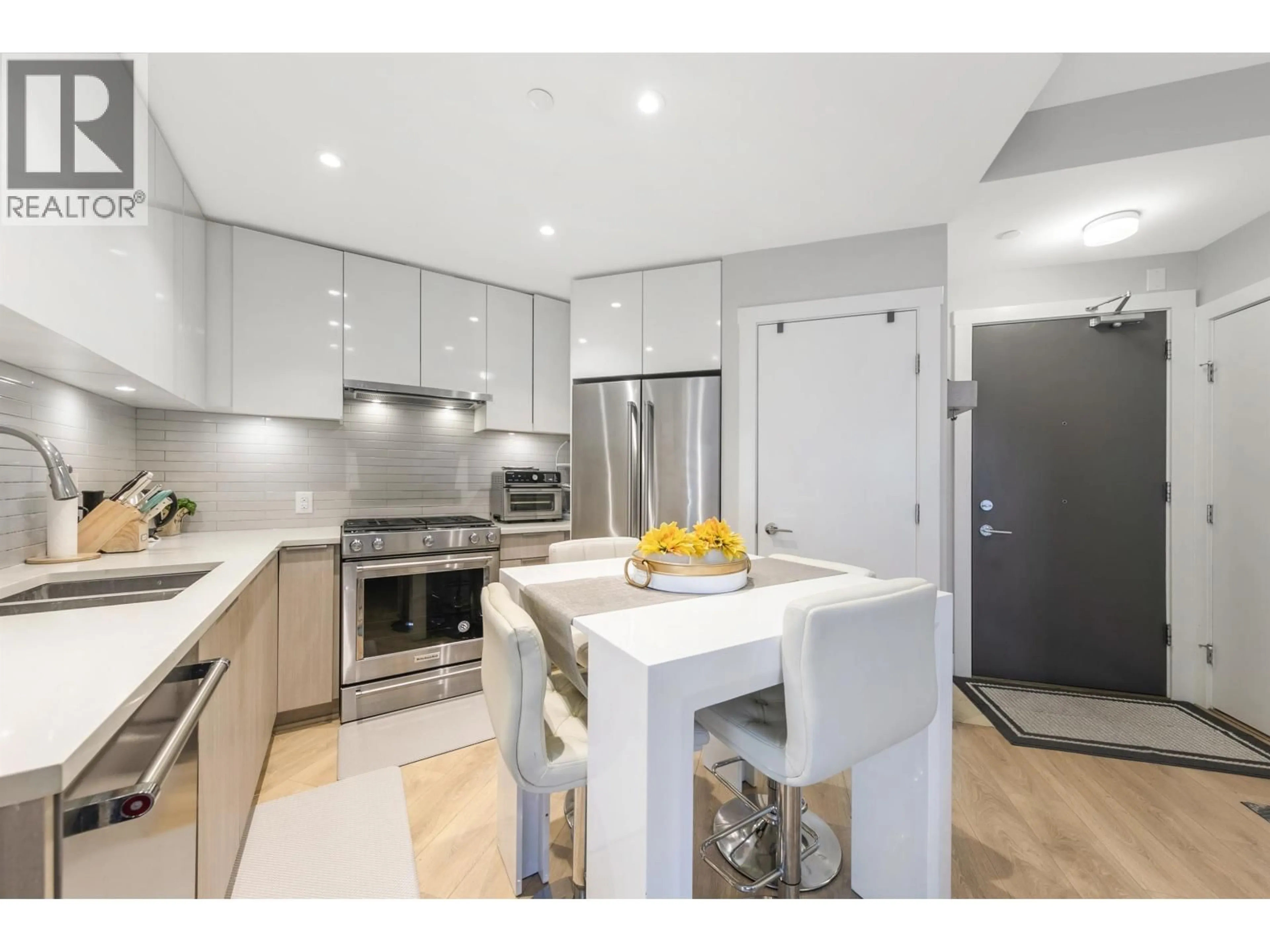 Open concept kitchen, unknown for 413 - 3588 SAWMILL CRESCENT, Vancouver British Columbia V5S0H5