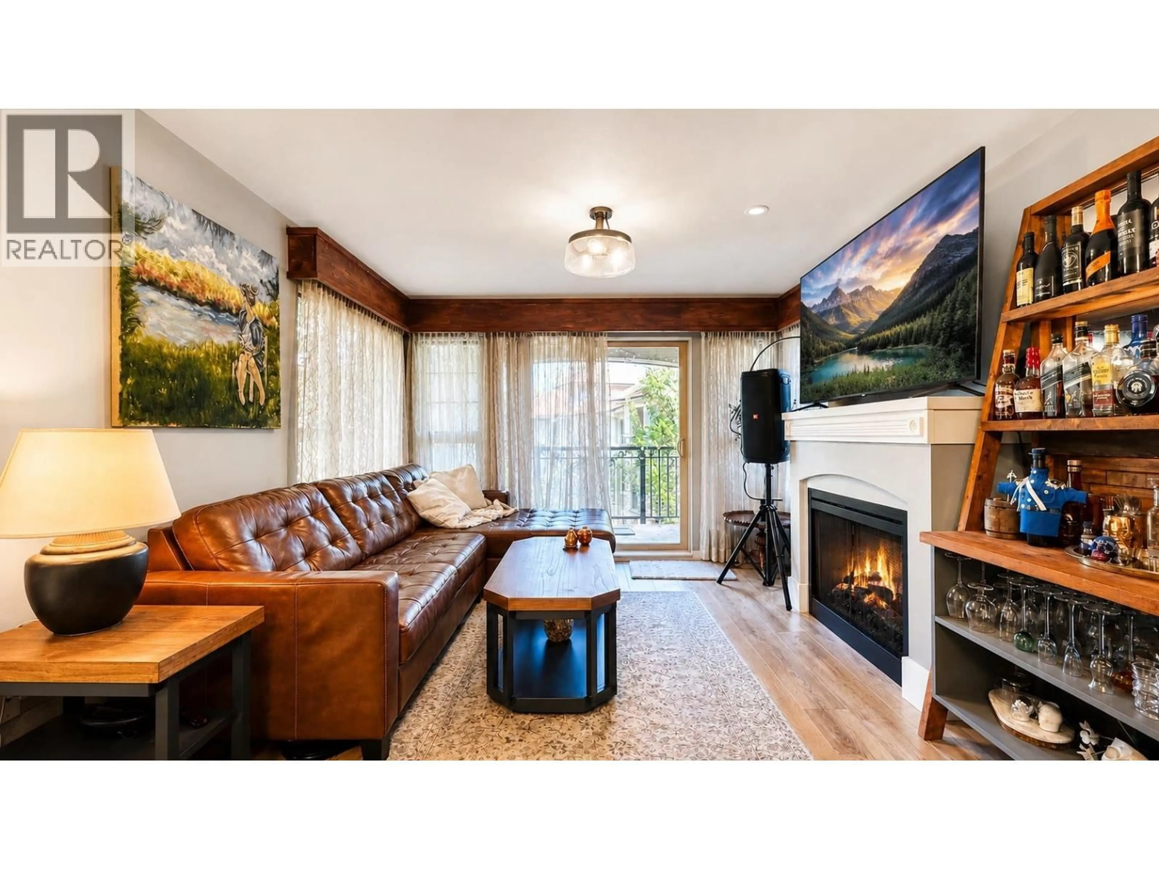 Living room with furniture, wood/laminate floor for 403 - 2958 SILVER SPRINGS BOULEVARD, Coquitlam British Columbia V3E3R9