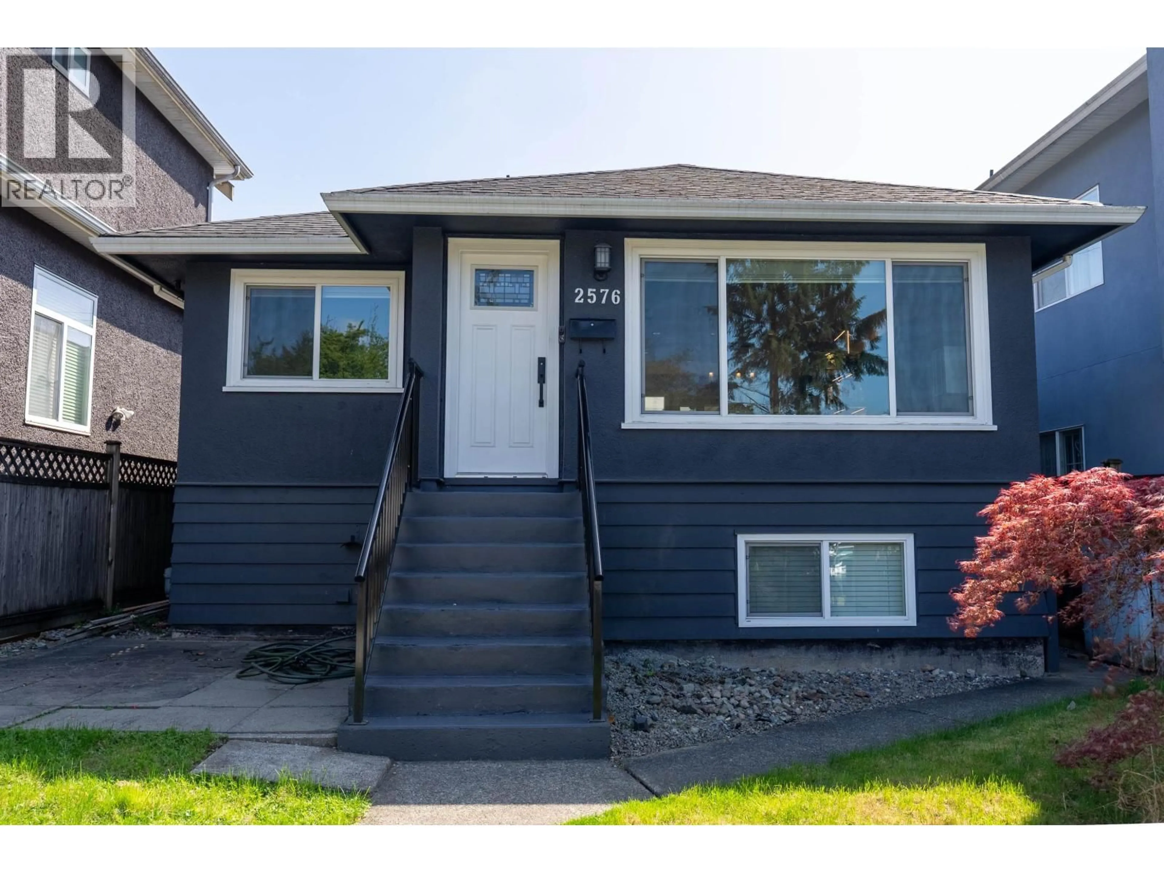 Home with vinyl exterior material, street for 2576 27TH AVENUE, Vancouver British Columbia V5R1N1