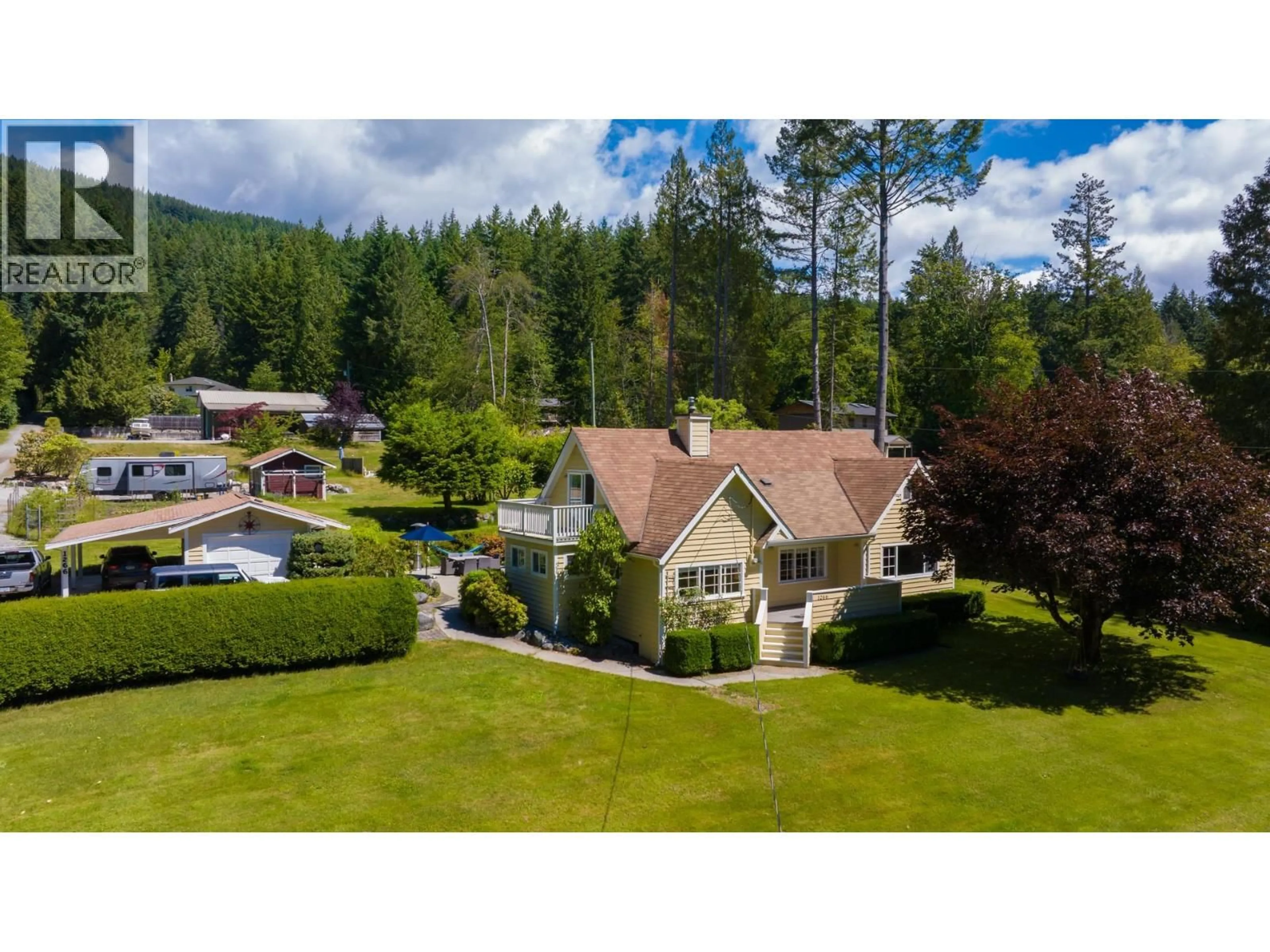 A pic from outside/outdoor area/front of a property/back of a property/a pic from drone, mountain view for 1266 REED ROAD, Gibsons British Columbia V0N1V7