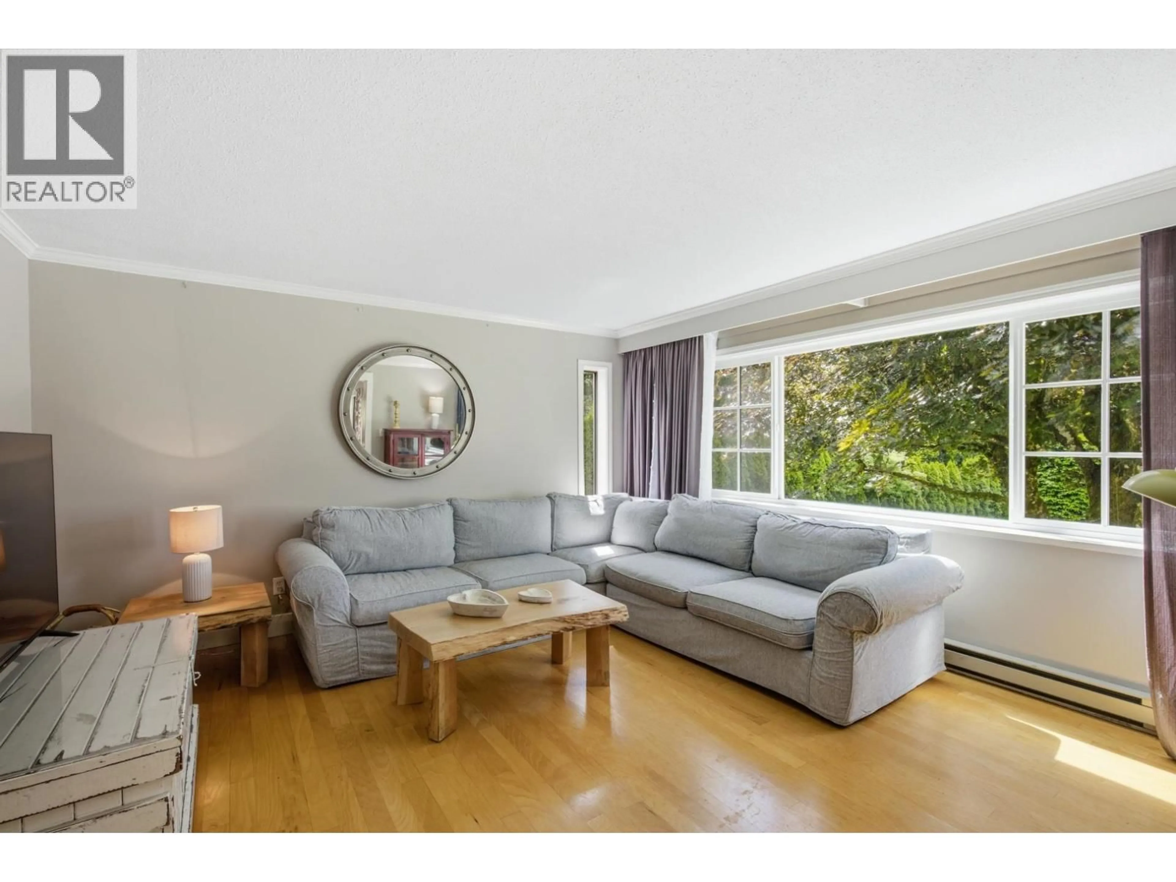 Living room with furniture, wood/laminate floor for 1266 REED ROAD, Gibsons British Columbia V0N1V7