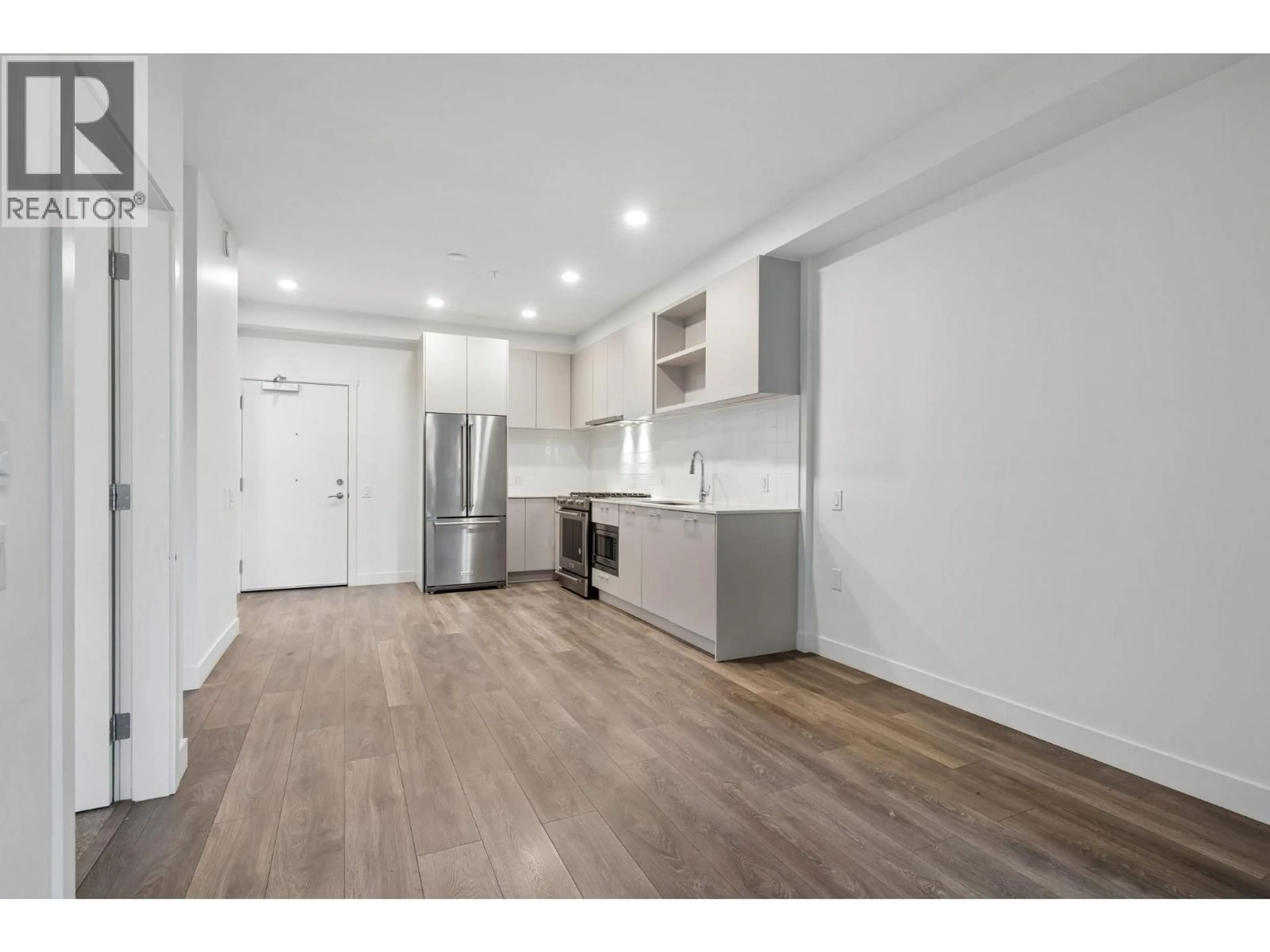 Open concept kitchen, wood/laminate floor for 120 - 735 ANSKAR COURT, Coquitlam British Columbia V3J0L7