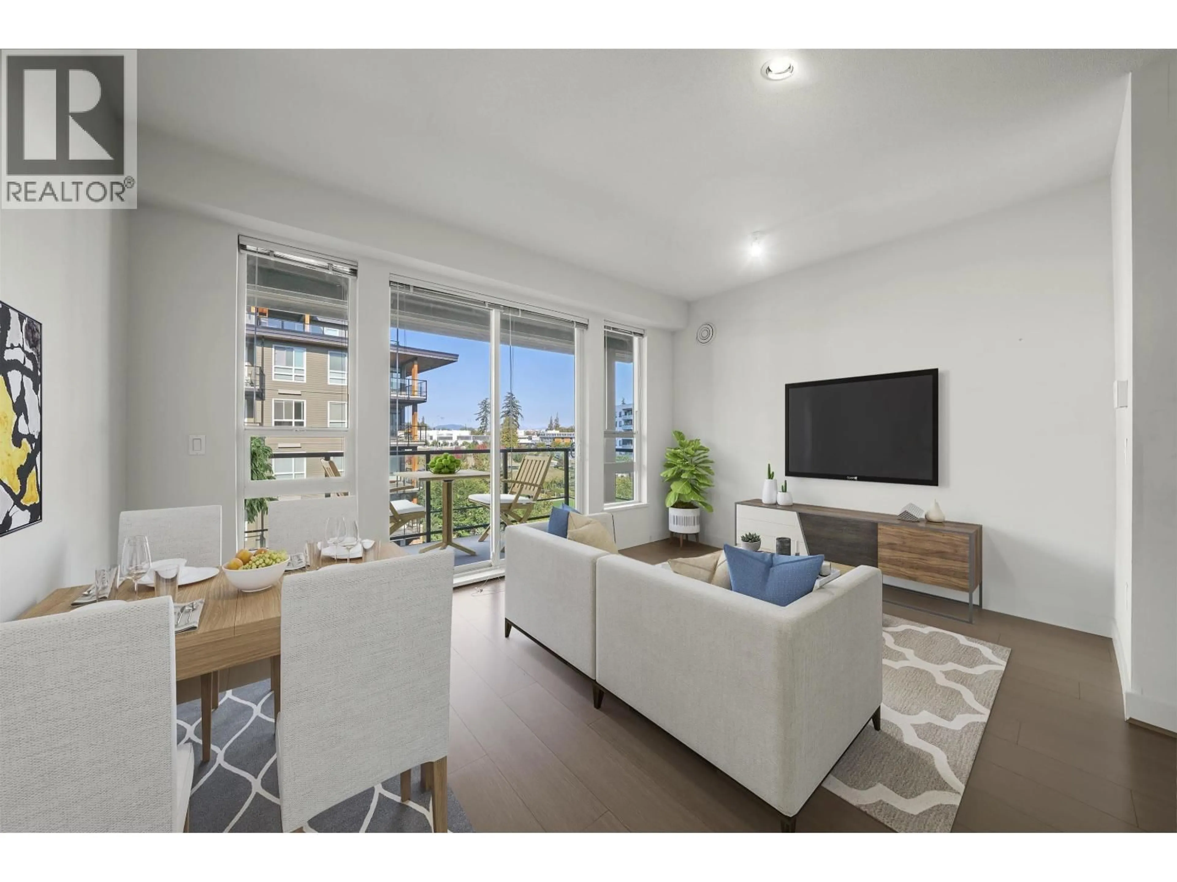 Living room with furniture, wood/laminate floor for 611 - 6033 GRAY AVENUE, Vancouver British Columbia V6S0G3