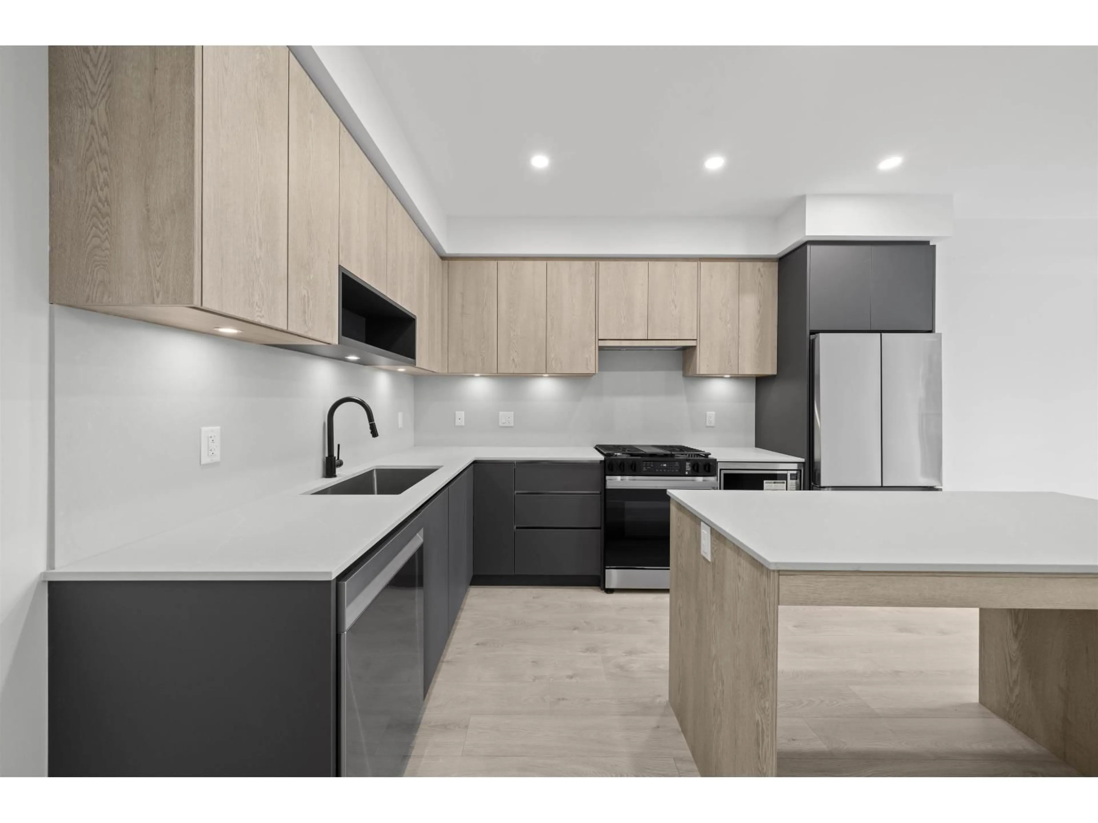 Open concept kitchen, unknown for 206 - 6585 195A STREET, Surrey British Columbia V4N6Y9