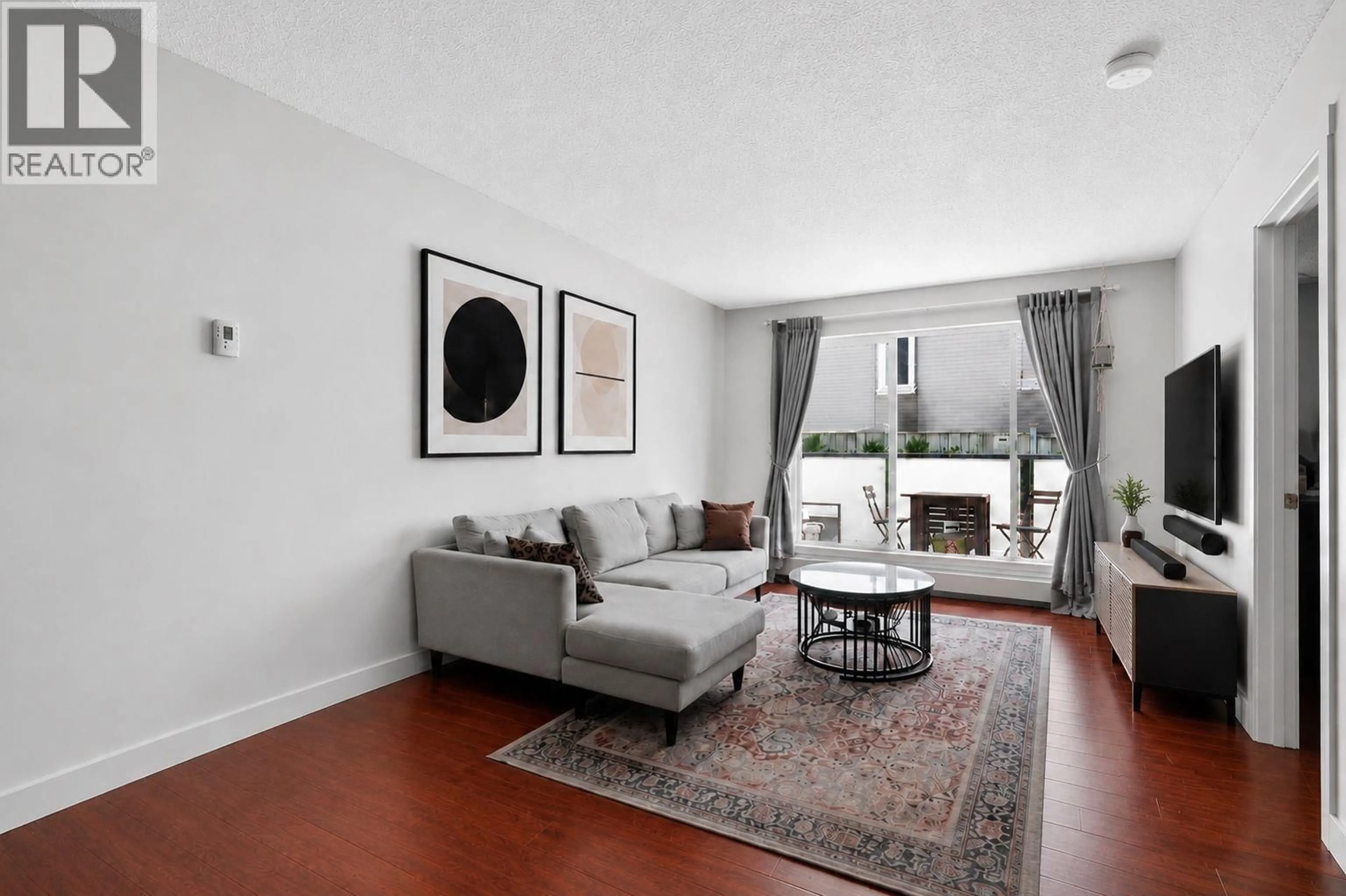 Living room with furniture, unknown for 202 - 2328 OXFORD STREET, Vancouver British Columbia V5L1G3