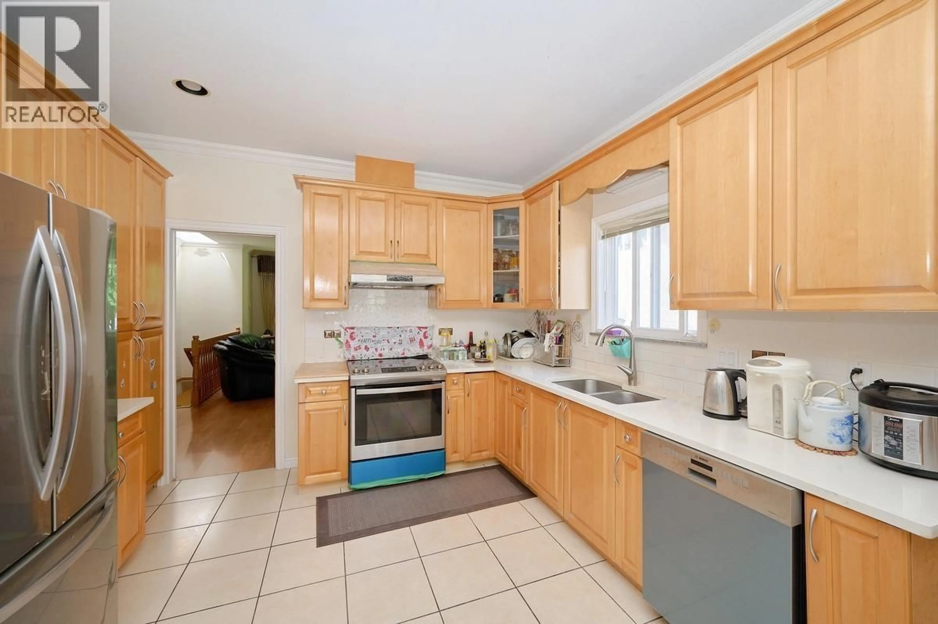 Standard kitchen, ceramic/tile floor for 2326 CHARLES STREET, Vancouver British Columbia V5L2V5