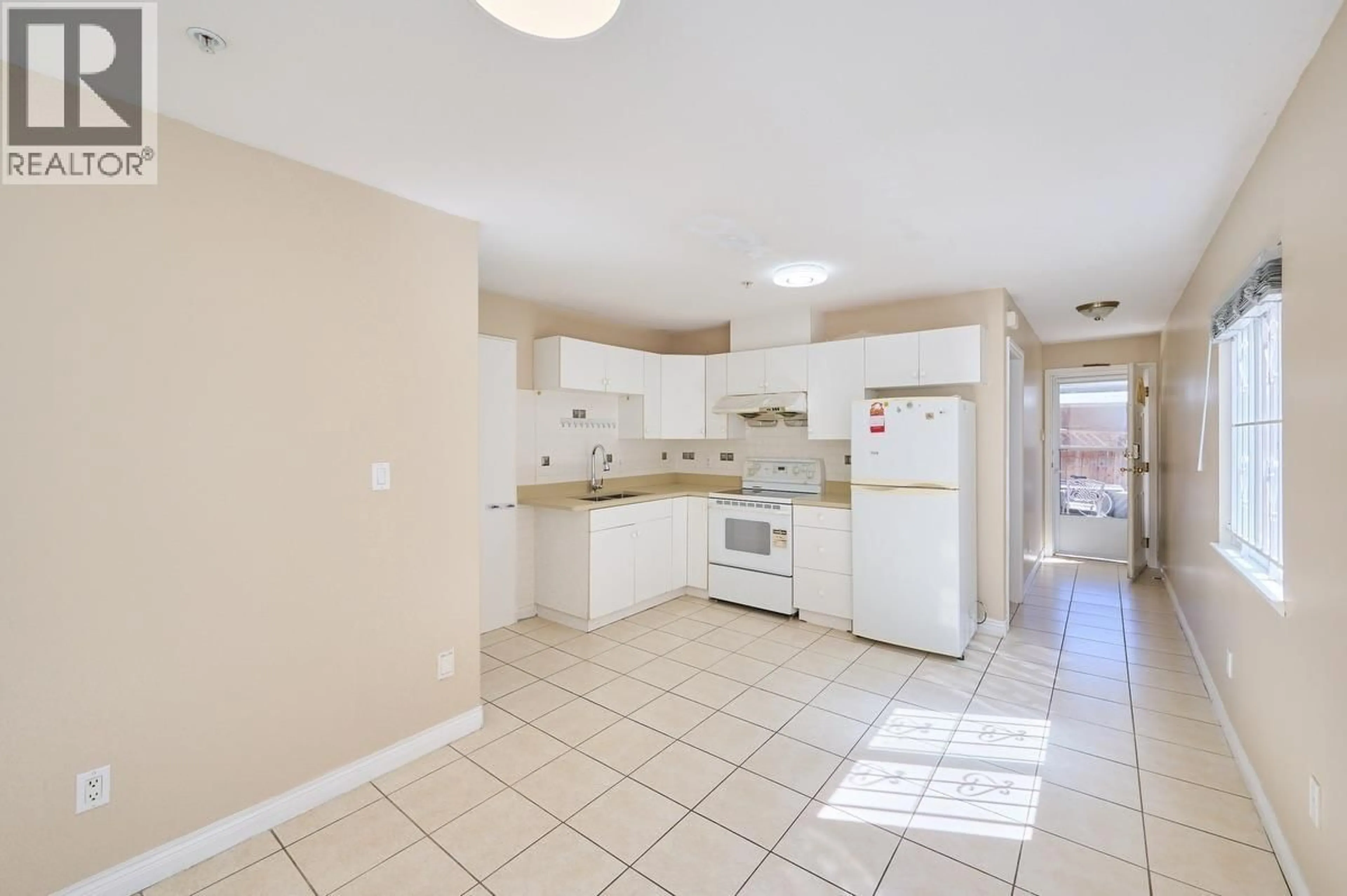 Standard kitchen, ceramic/tile floor for 2326 CHARLES STREET, Vancouver British Columbia V5L2V5