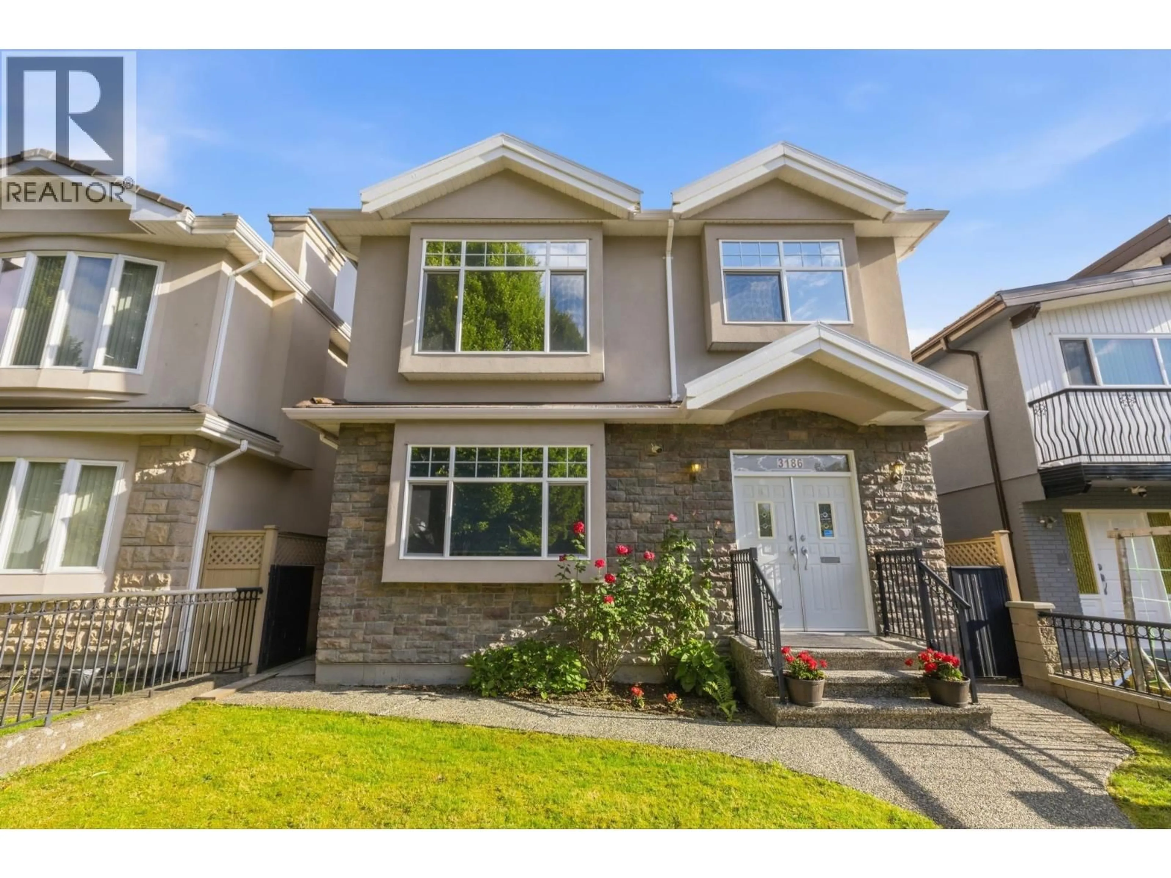 Home with vinyl exterior material, street for 3186 18TH AVENUE, Vancouver British Columbia V5M2R5