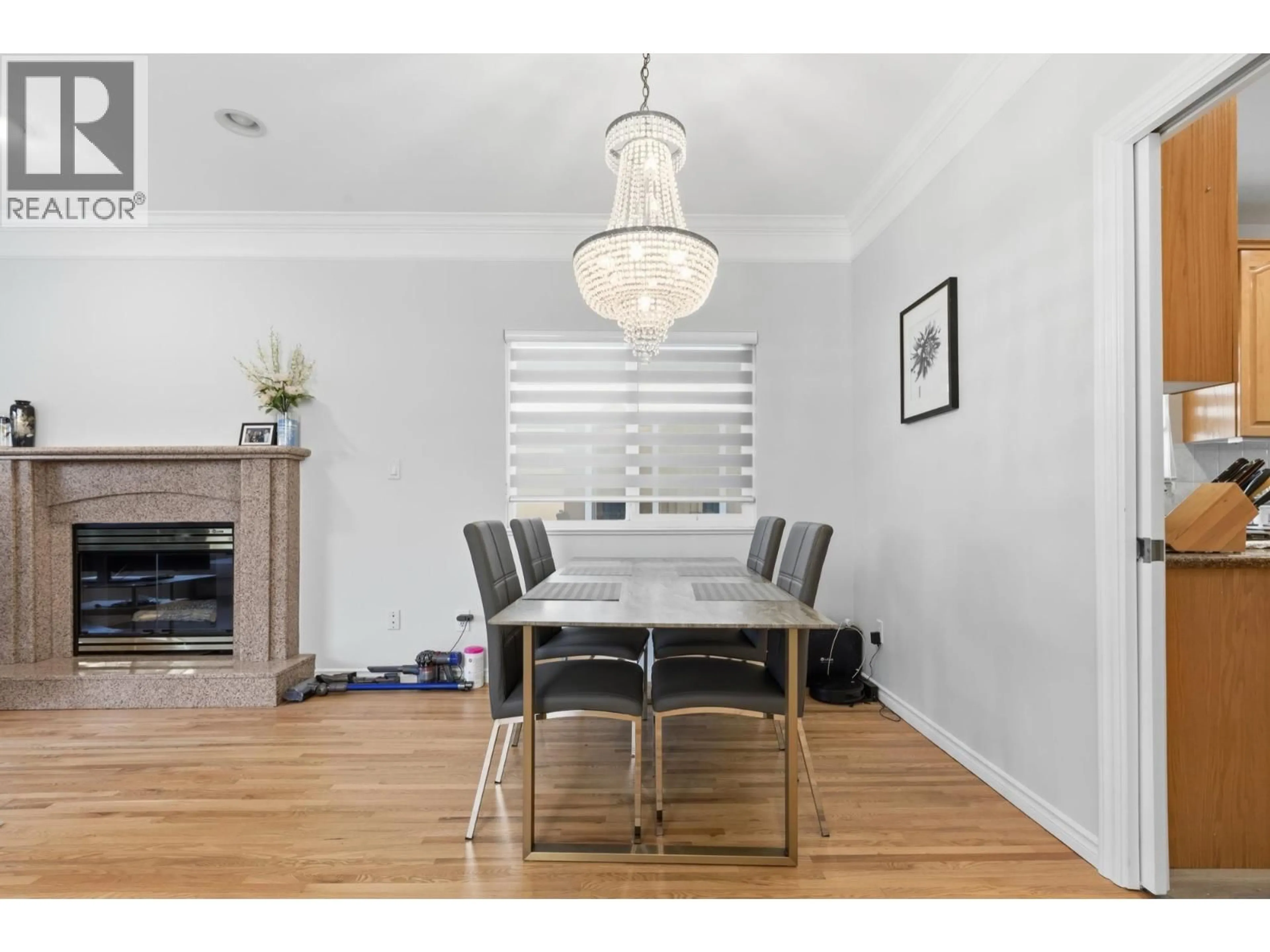 Dining room, wood/laminate floor for 3186 18TH AVENUE, Vancouver British Columbia V5M2R5