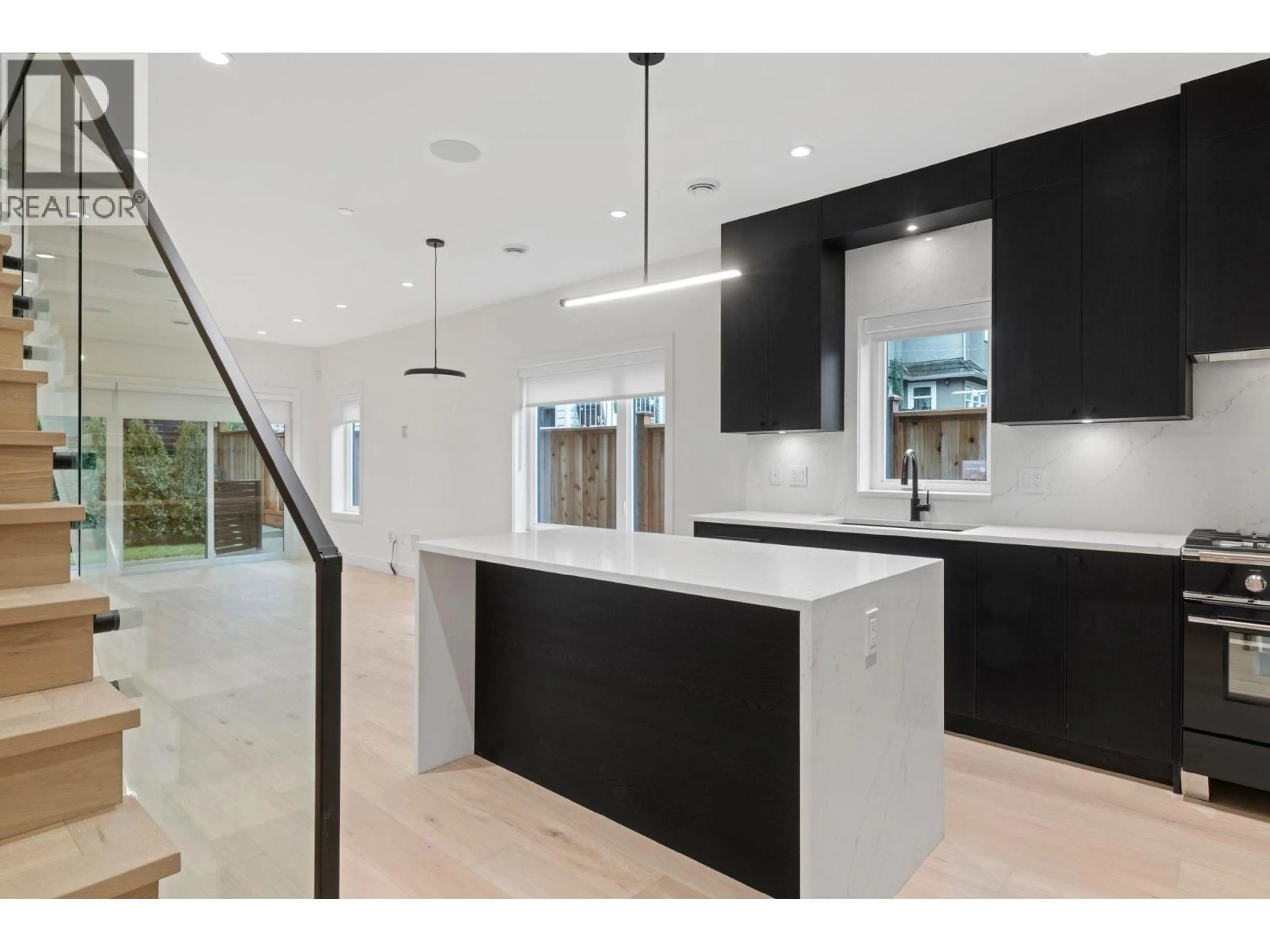 Contemporary kitchen, ceramic/tile floor for 1 - 2539 GRANT AVENUE, Vancouver British Columbia V5K3G6