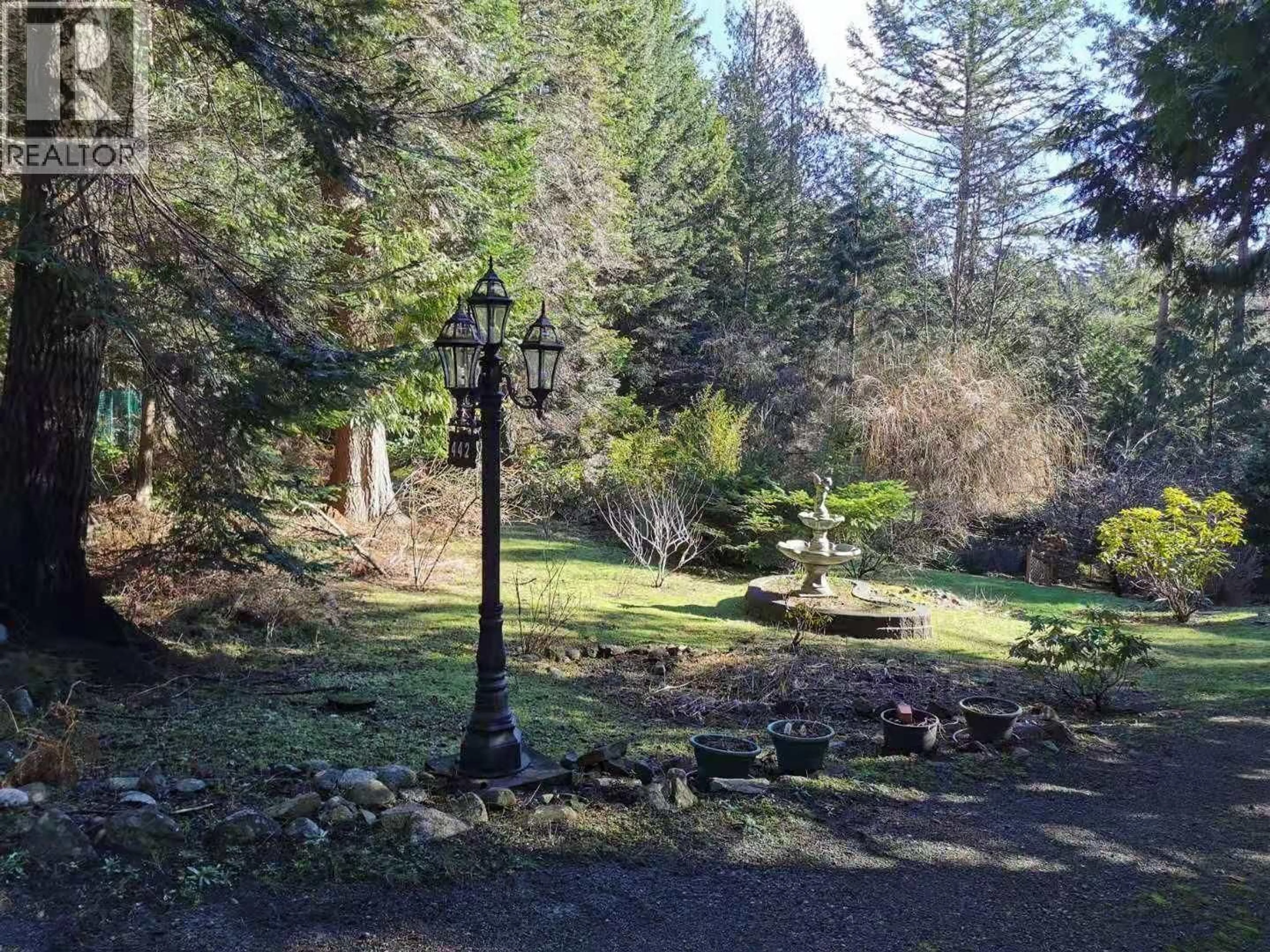 A pic from outside/outdoor area/front of a property/back of a property/a pic from drone, forest/trees view for 442 MARINERS WAY, Mayne Island British Columbia V0N2J2