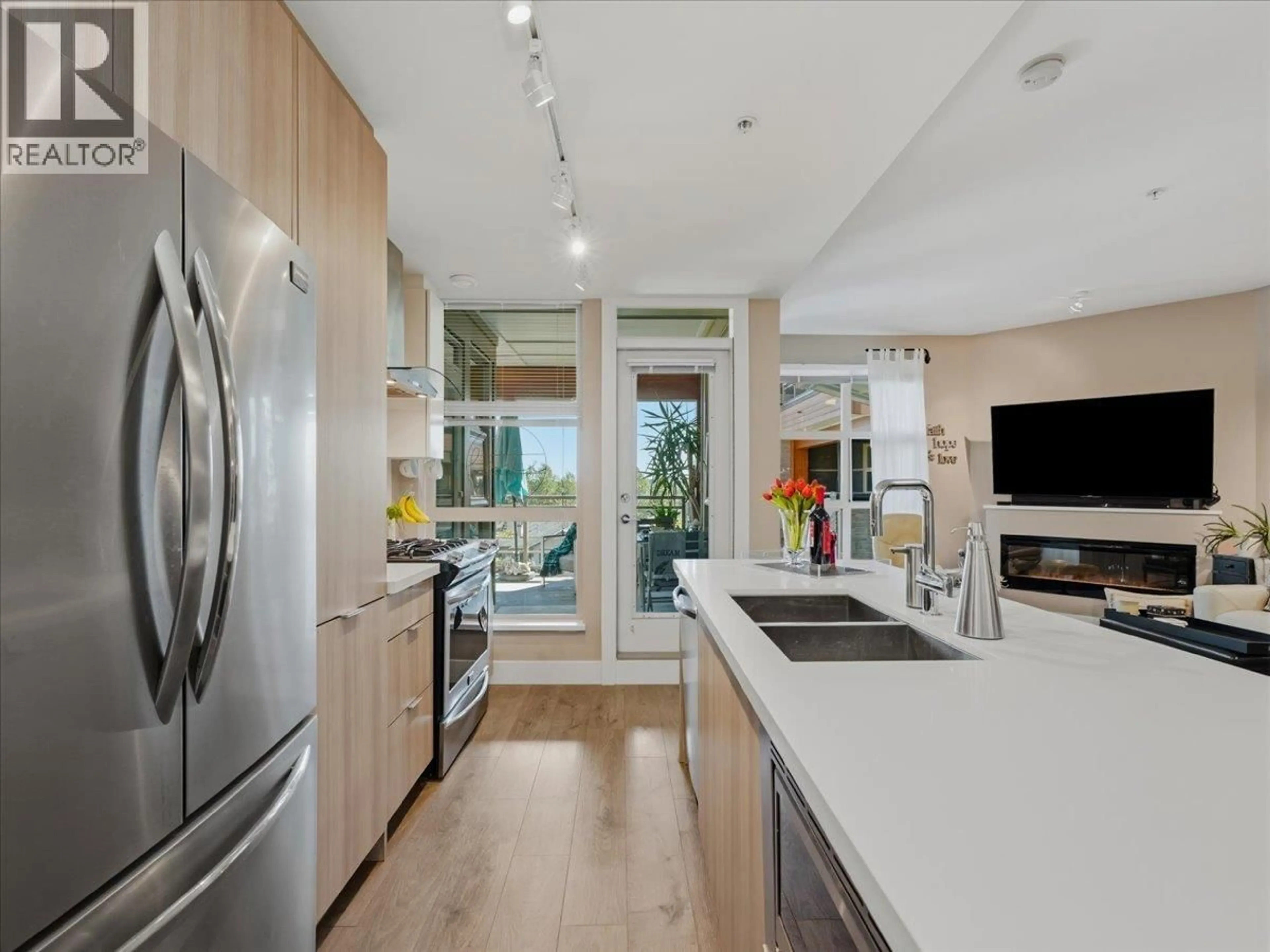 Open concept kitchen, unknown for 411 - 3602 ALDERCREST DRIVE, North Vancouver British Columbia V7G0A2