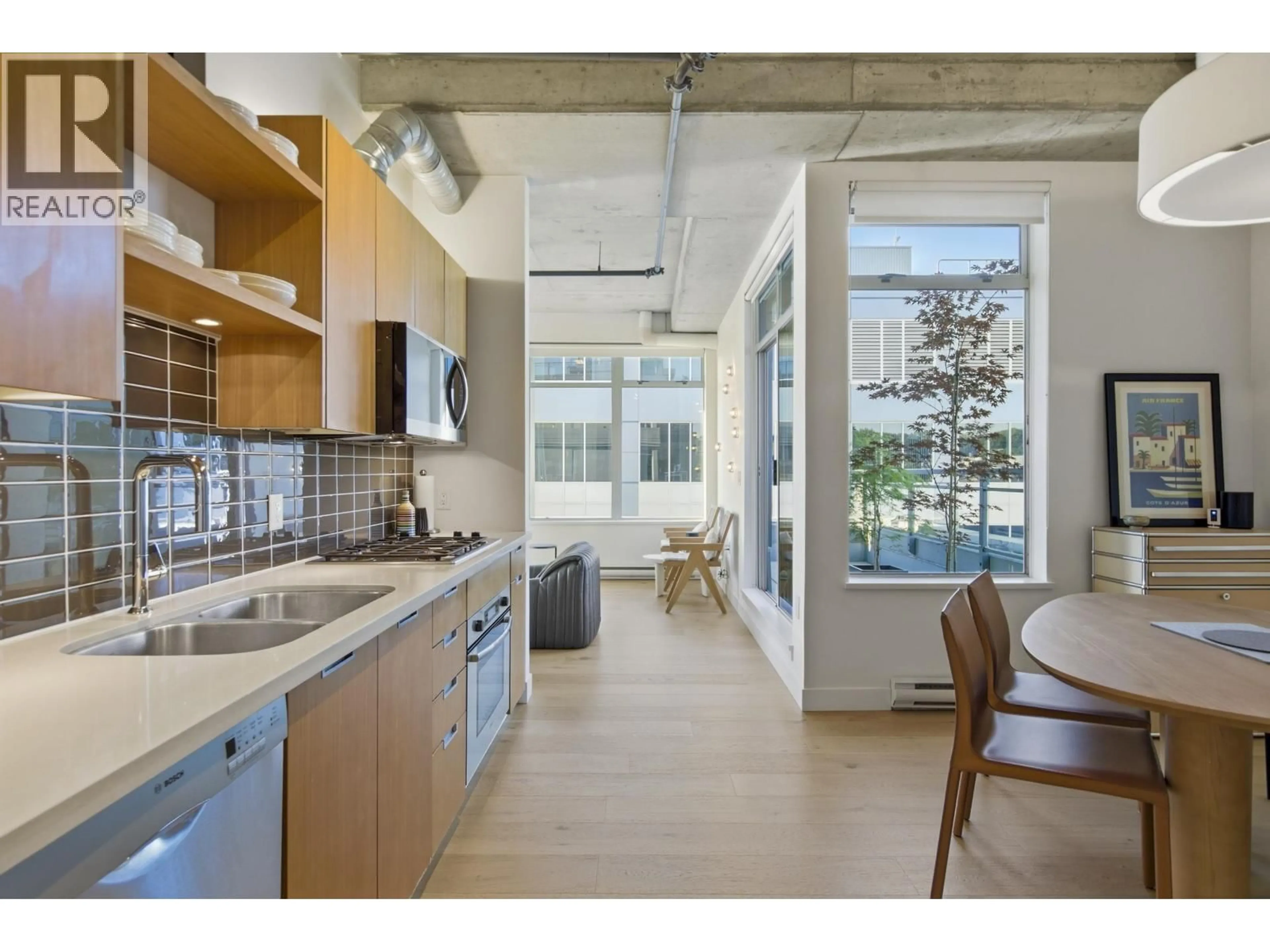 Open concept kitchen, unknown for 604 - 495 6TH AVENUE, Vancouver British Columbia V5Y1L3