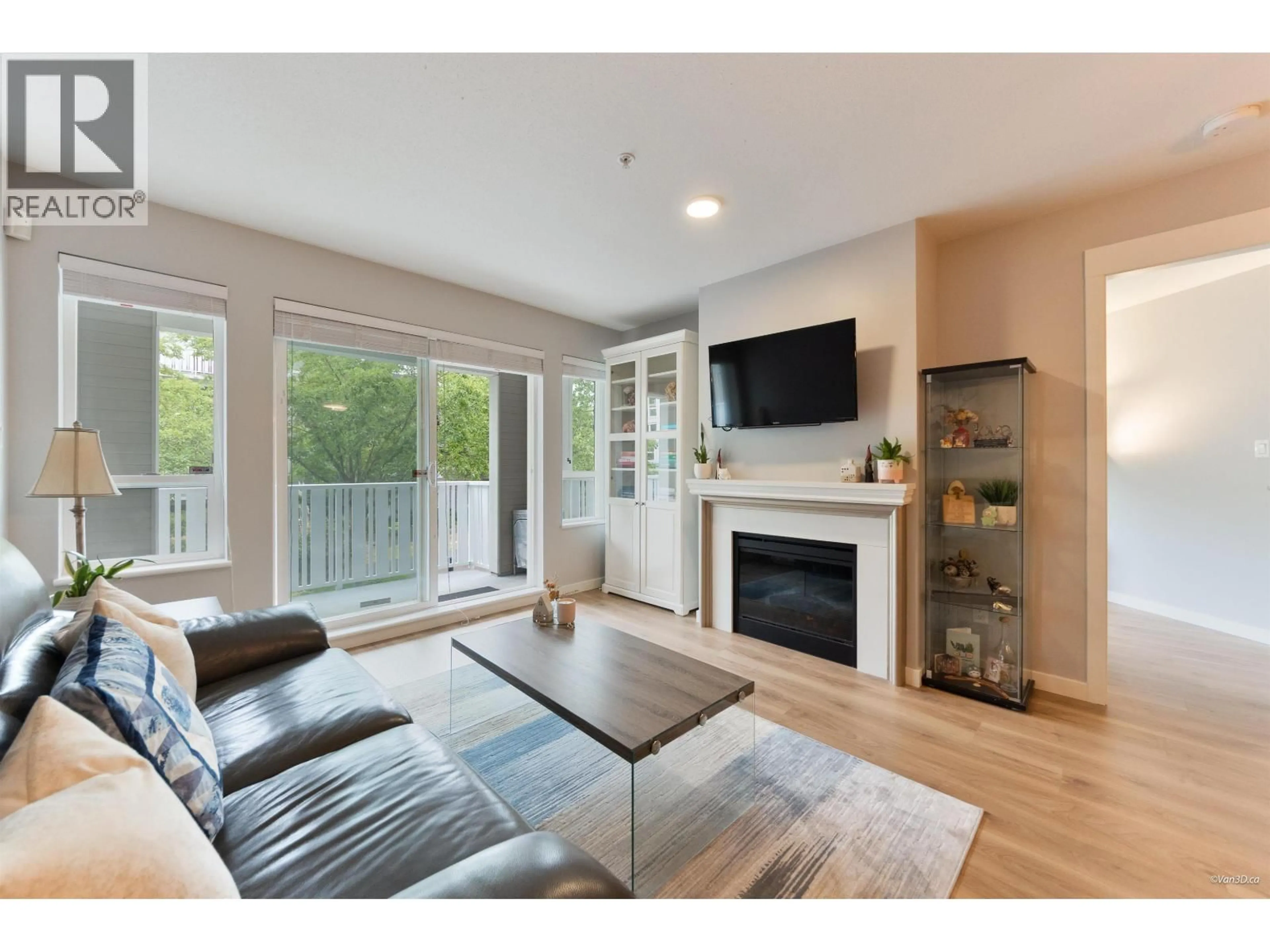 Living room with furniture, wood/laminate floor for 222 - 8120 JONES ROAD, Richmond British Columbia V6Y4K7