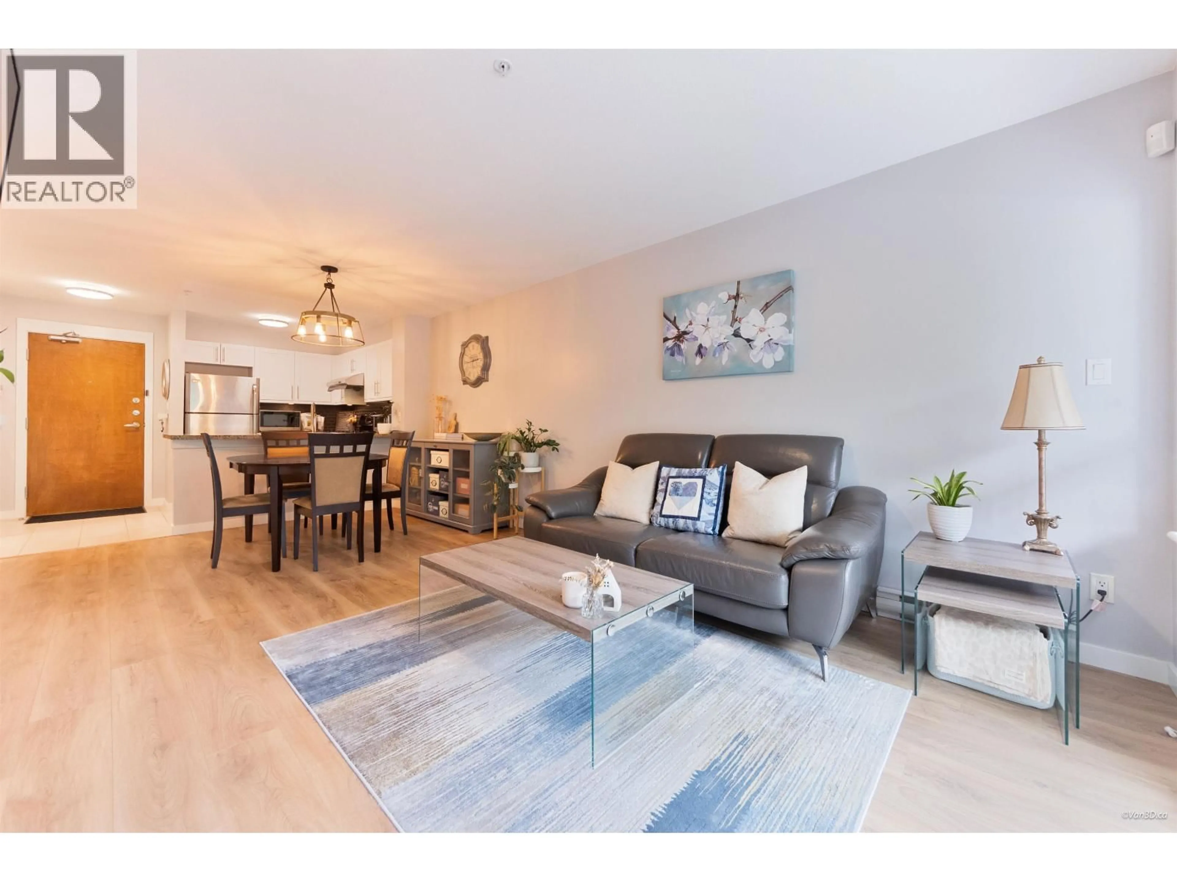 Living room with furniture, wood/laminate floor for 222 - 8120 JONES ROAD, Richmond British Columbia V6Y4K7