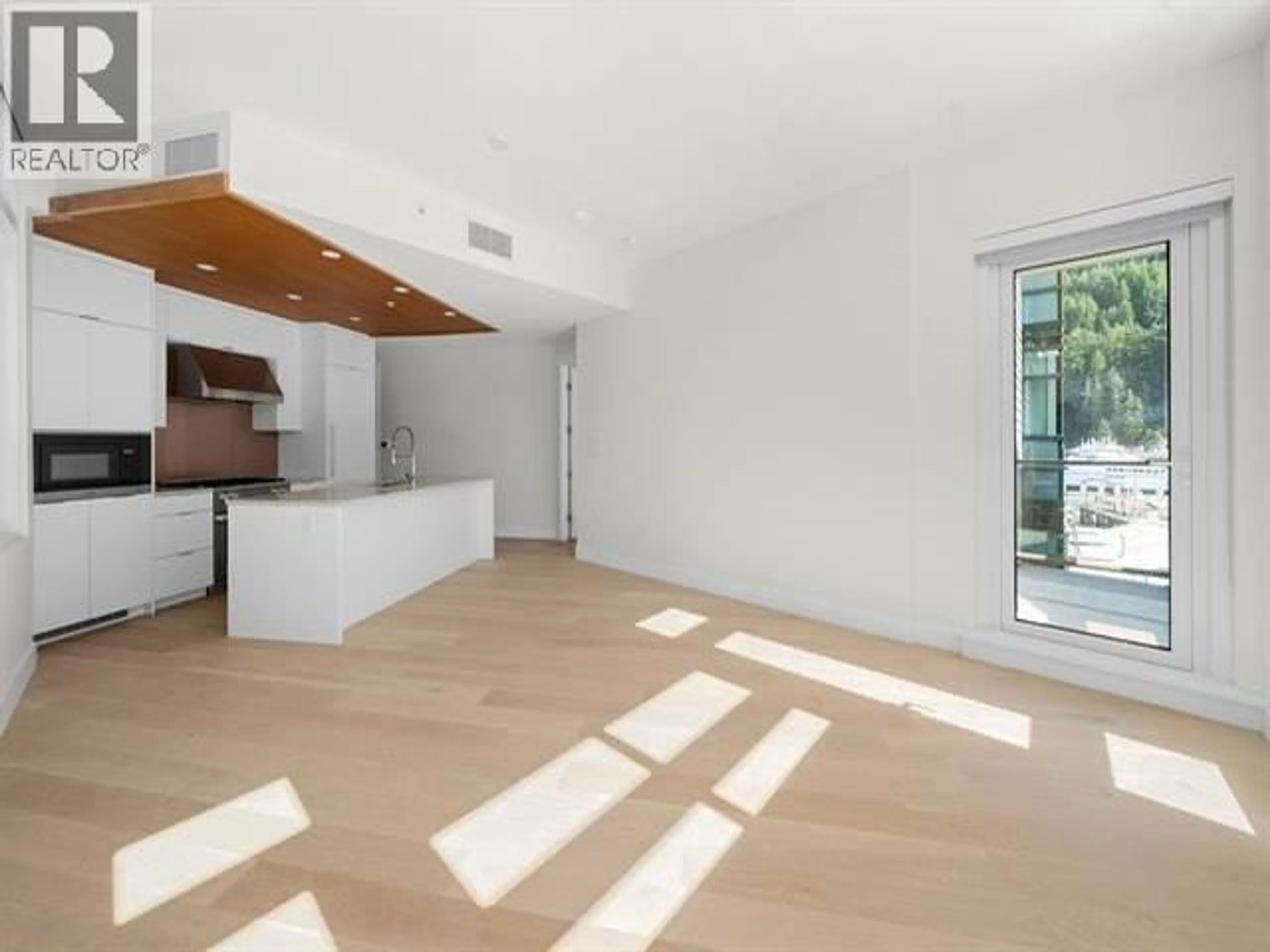 Open concept kitchen, unknown for 204 - 6699 NELSON AVENUE, West Vancouver British Columbia V7W2B2