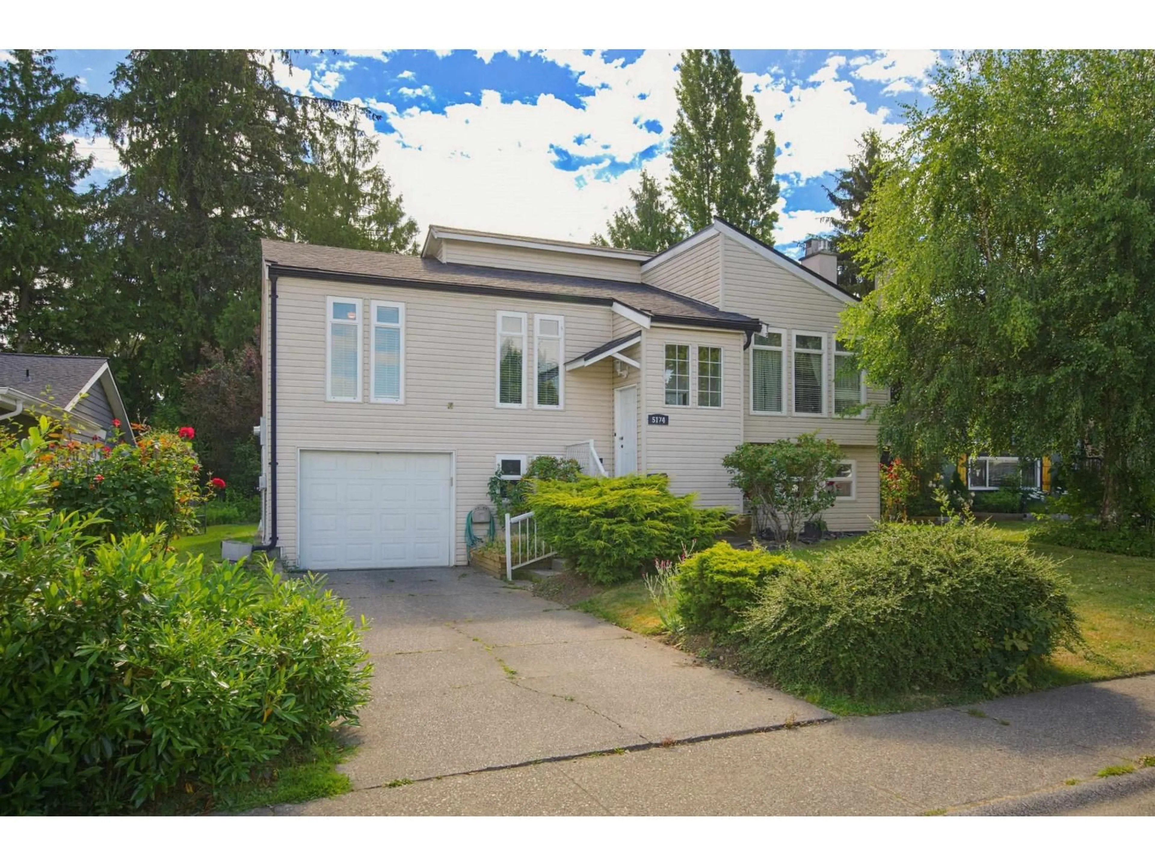 Home with vinyl exterior material, street for 5174 209A STREET, Langley British Columbia V3A7K8