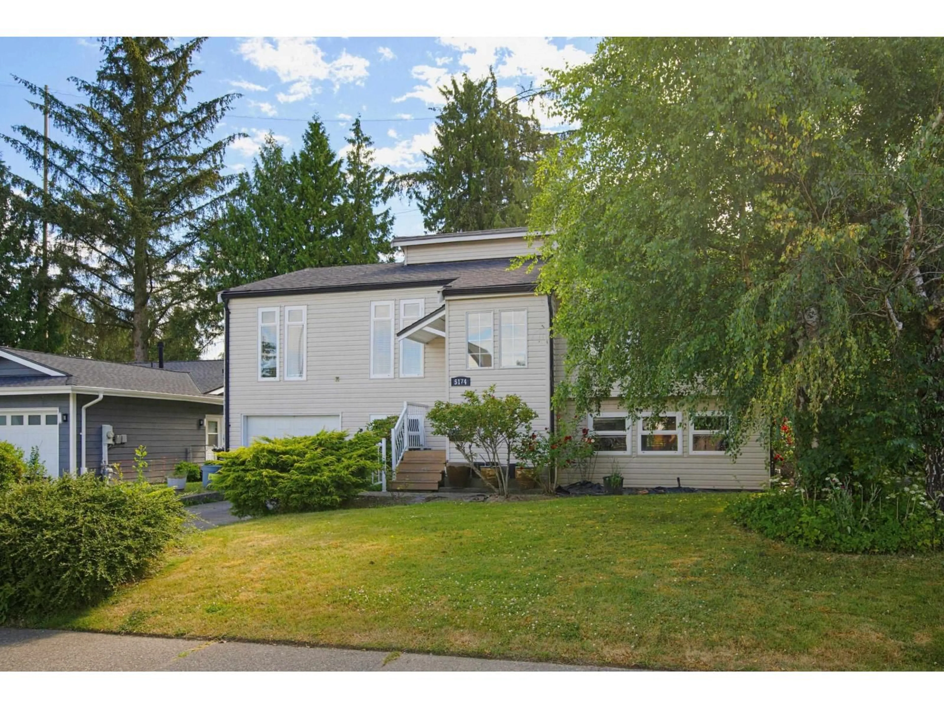 Home with vinyl exterior material, street for 5174 209A STREET, Langley British Columbia V3A7K8
