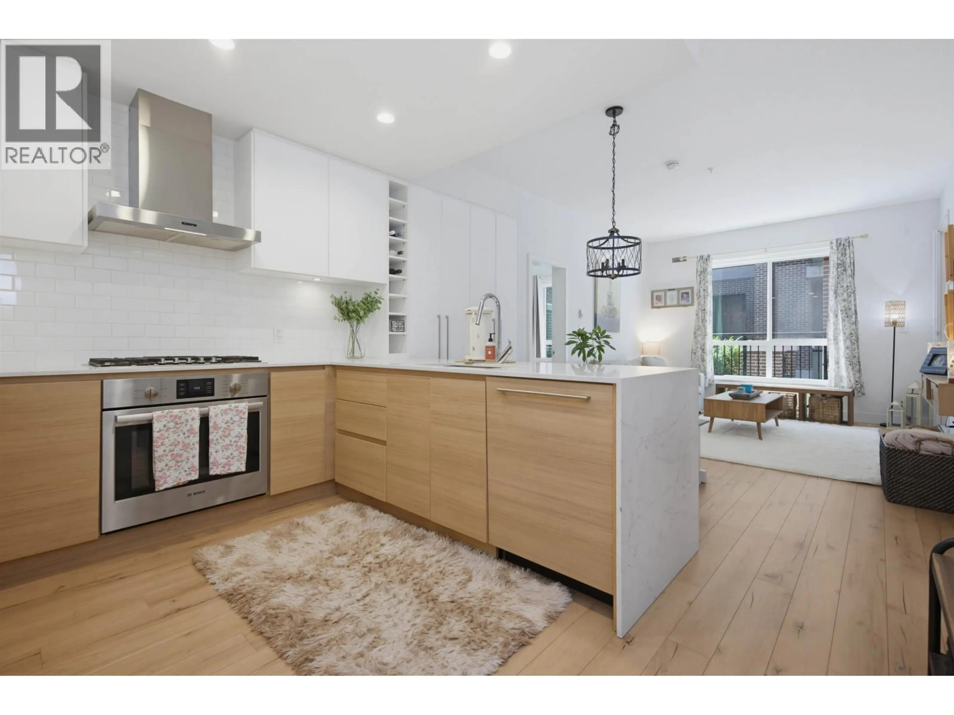Open concept kitchen, wood/laminate floor for 110 - 55 KLAHANIE DRIVE, Port Moody British Columbia V3H0M9