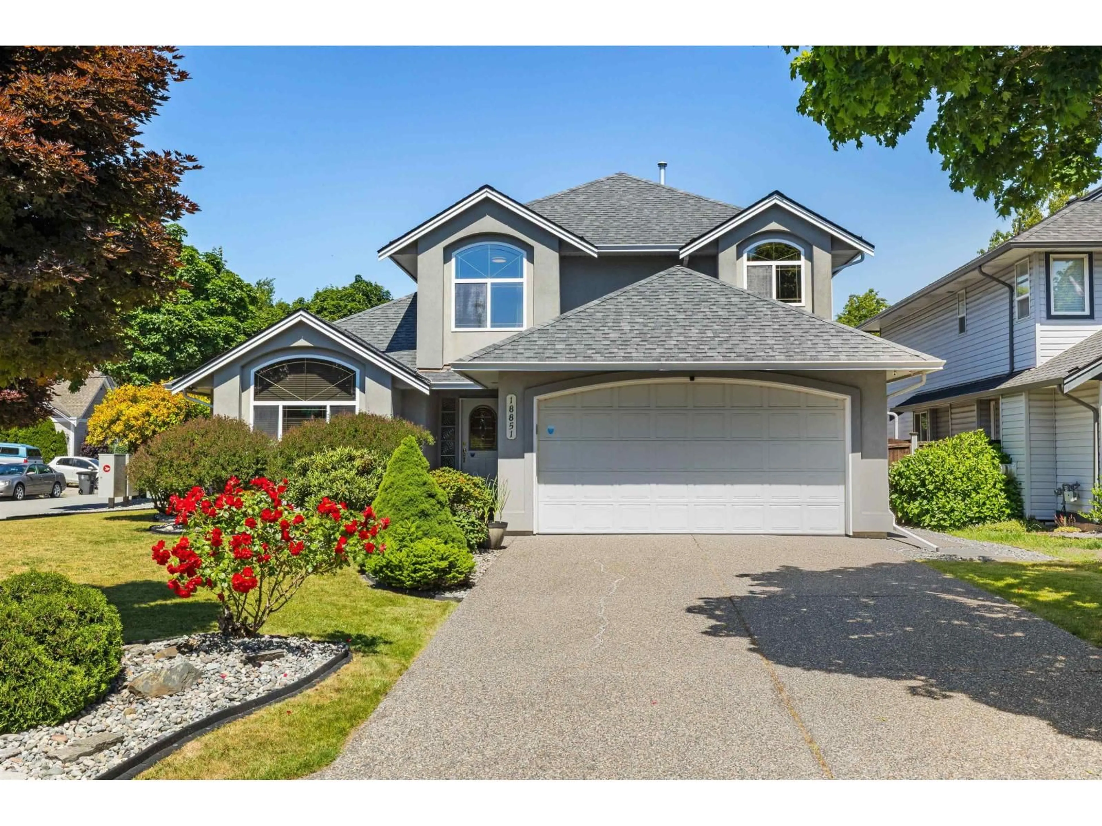 Home with vinyl exterior material, street for 18851 64A AVENUE, Surrey British Columbia V3S8V3