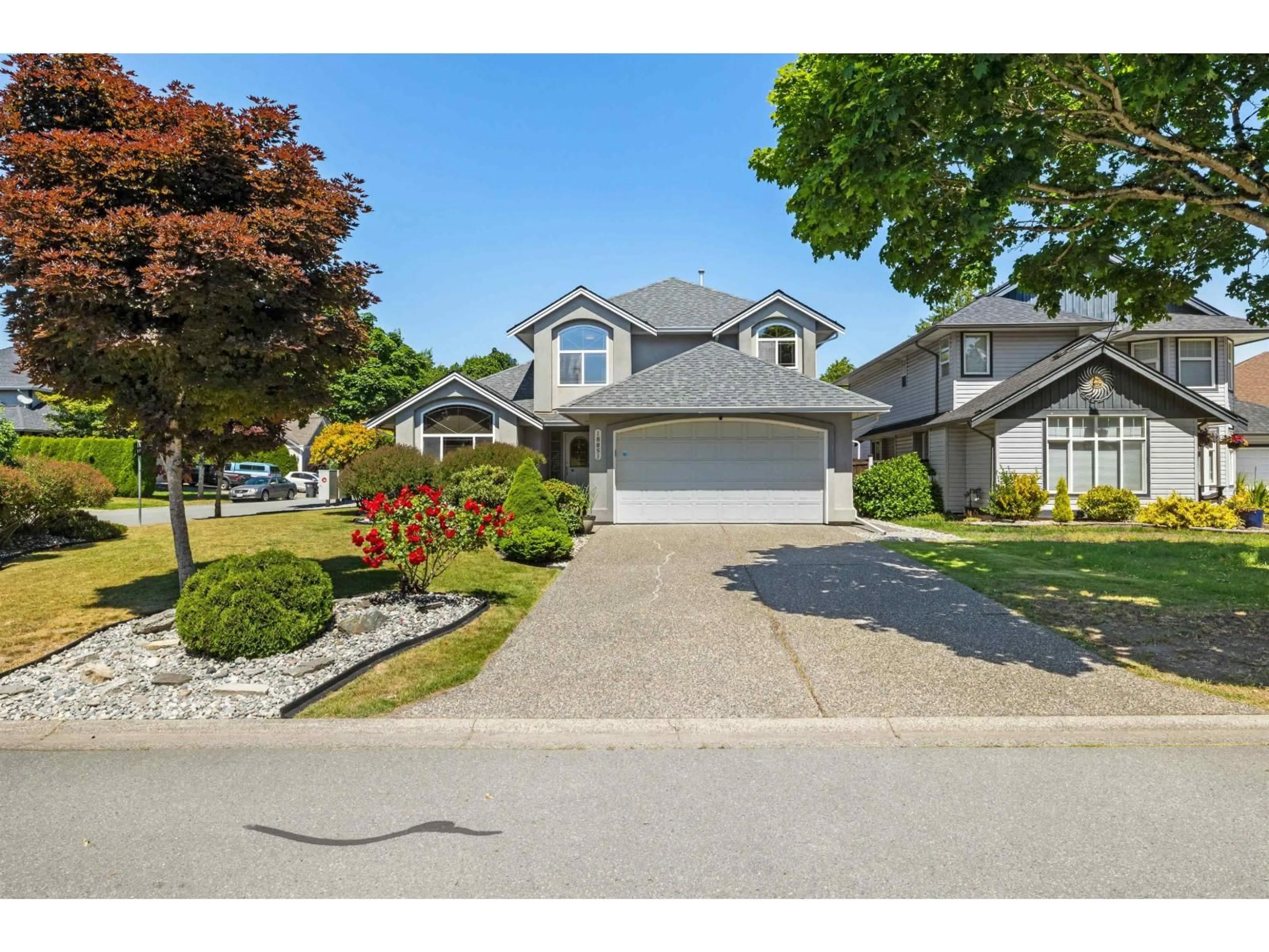A pic from outside/outdoor area/front of a property/back of a property/a pic from drone, street for 18851 64A AVENUE, Surrey British Columbia V3S8V3