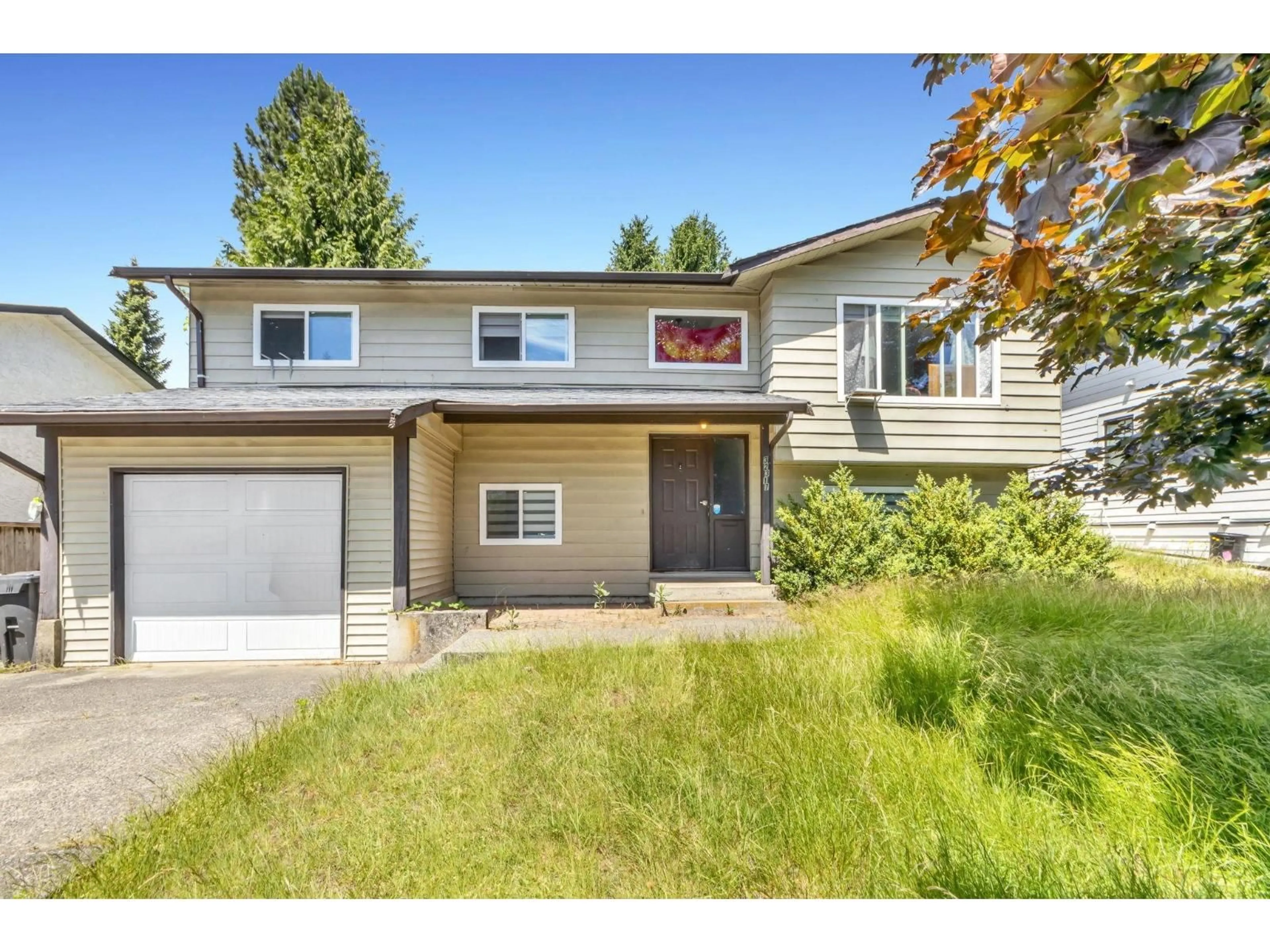 Home with vinyl exterior material, street for 32317 ADAIR AVENUE, Abbotsford British Columbia V2T4L7