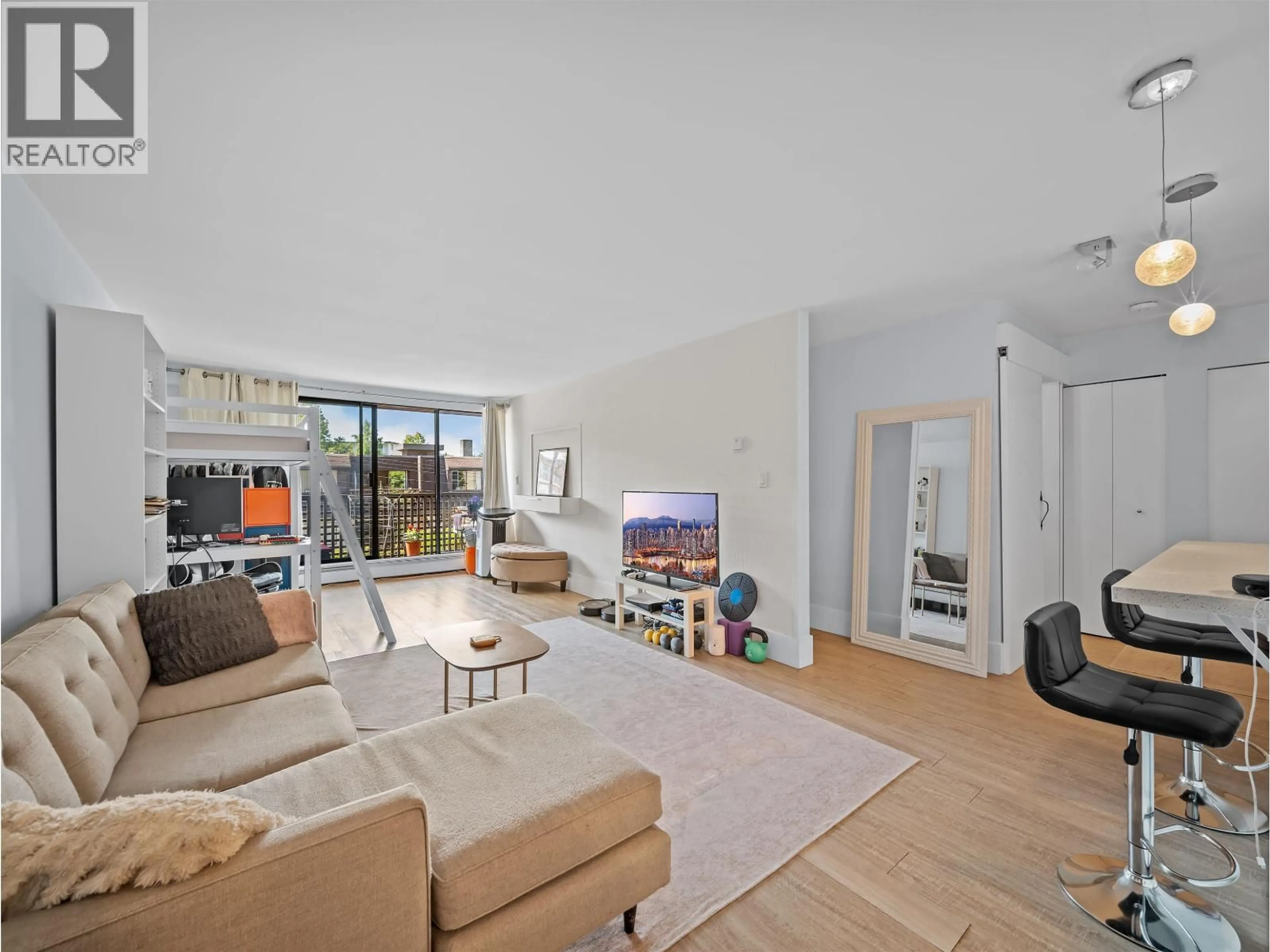 Living room with furniture, unknown for 210 - 141 13TH STREET, North Vancouver British Columbia V7M1N5
