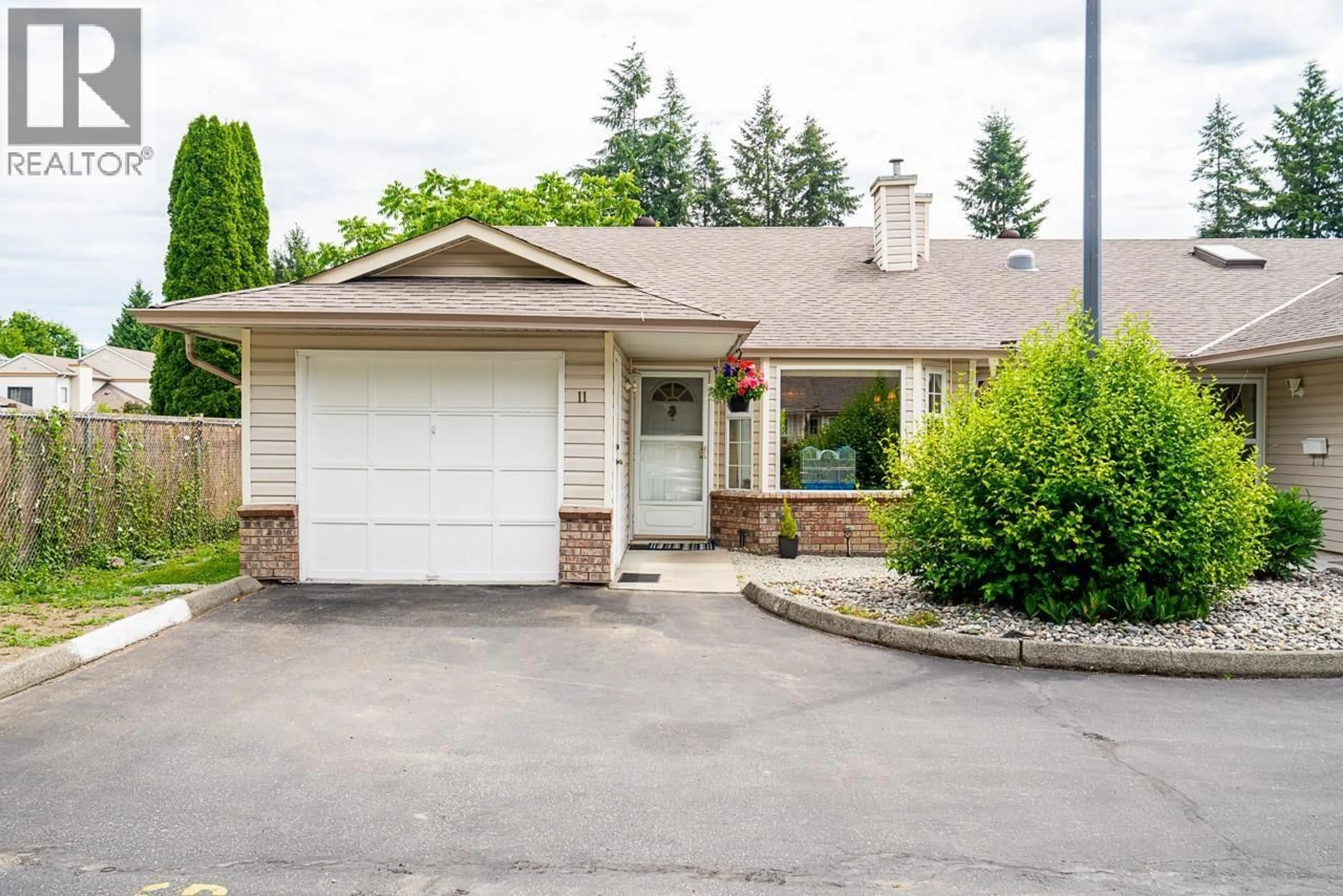 Home with vinyl exterior material, street for 11 - 12049 217TH STREET, Maple Ridge British Columbia V2X5L2