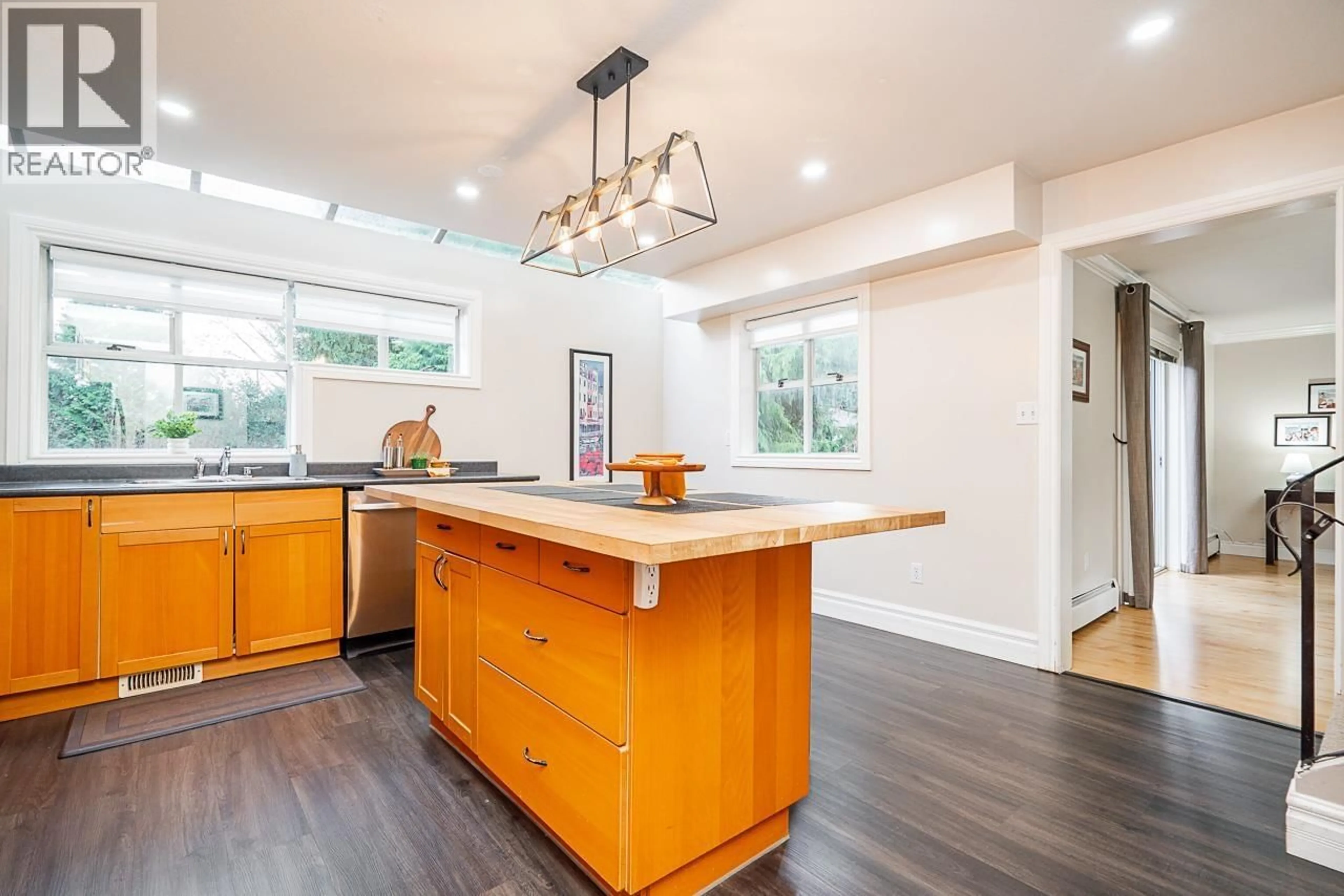 Open concept kitchen, wood/laminate floor for 4 - 3347 DEWDNEY TRUNK ROAD, Port Moody British Columbia V3H2E4