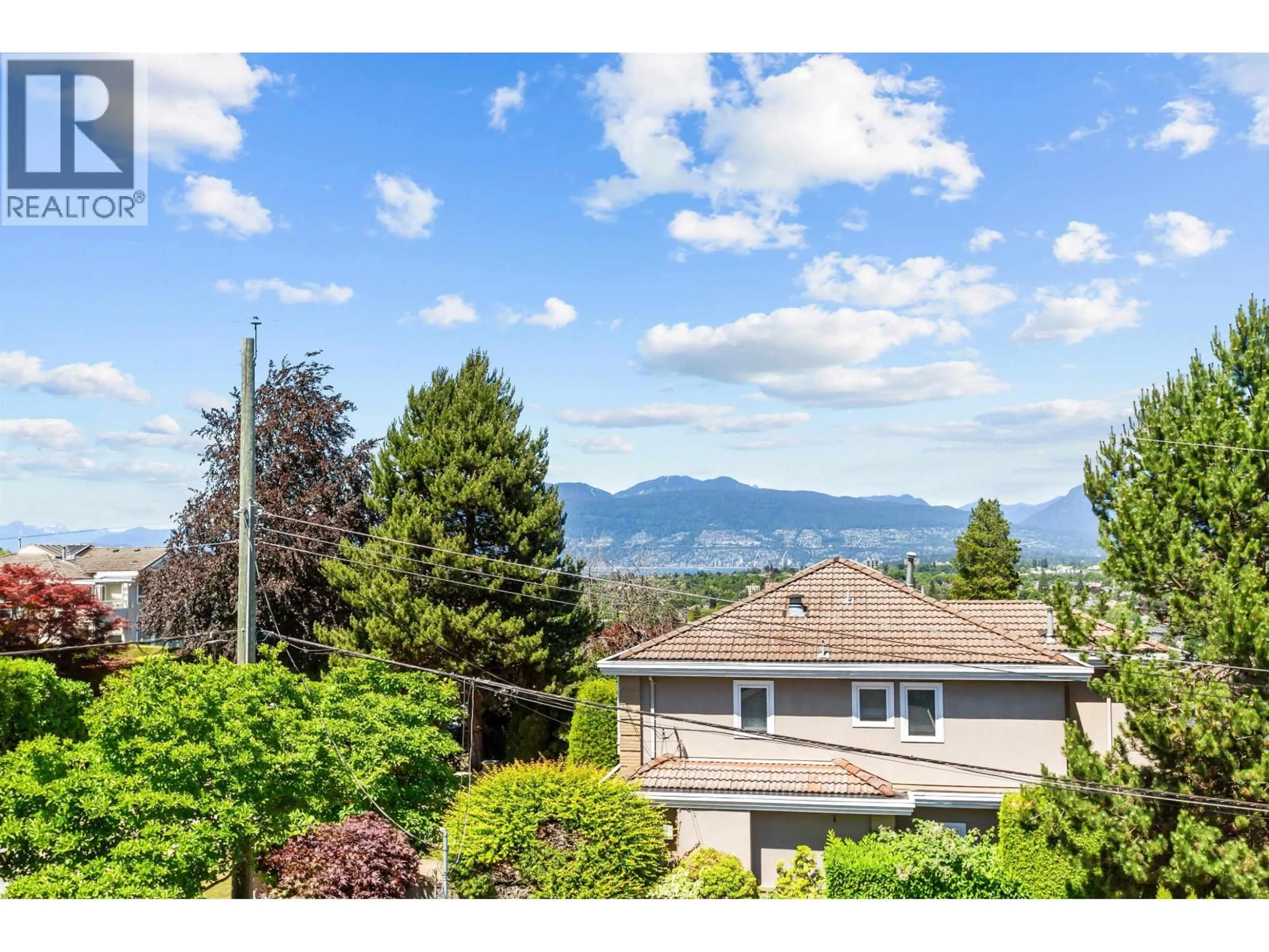 A pic from outside/outdoor area/front of a property/back of a property/a pic from drone, mountain view for 2495 33RD AVENUE, Vancouver British Columbia V6M1C4