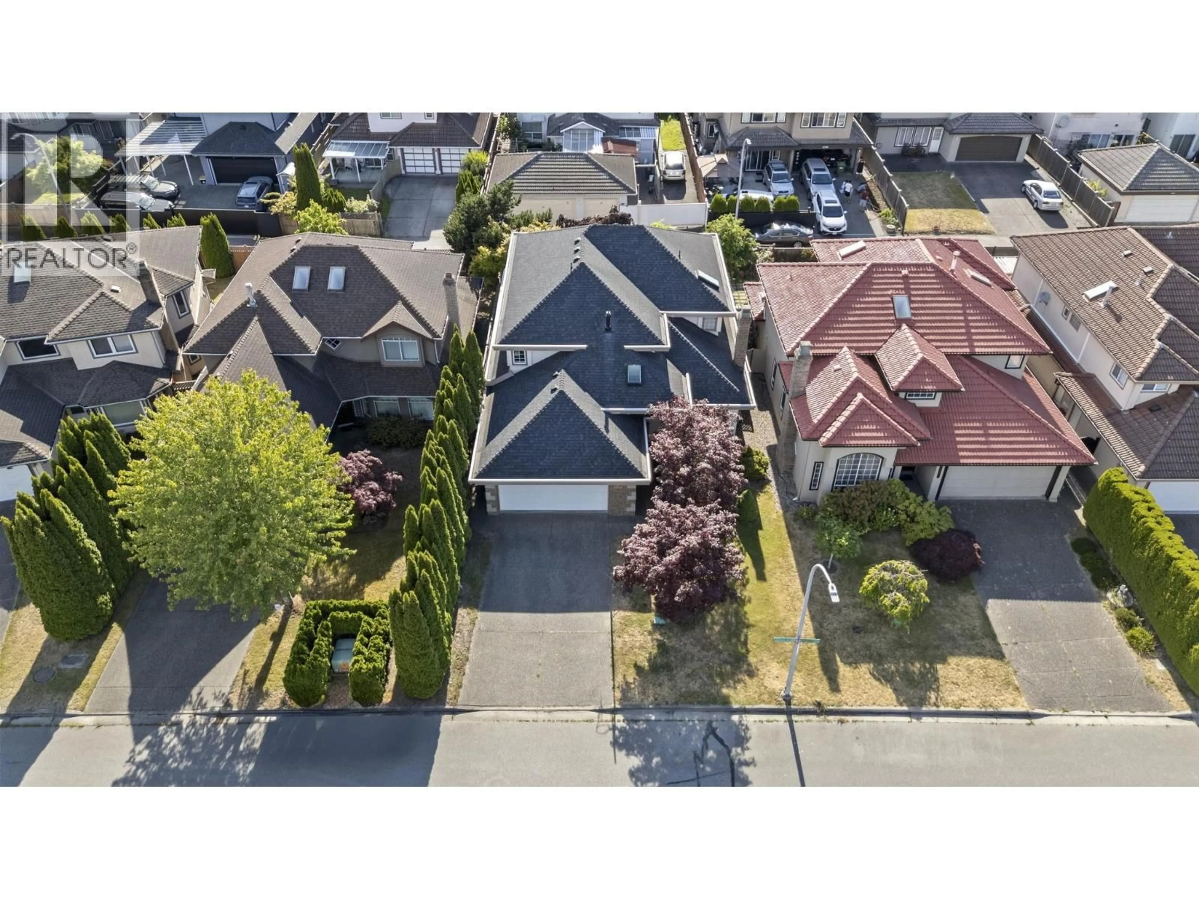 A pic from outside/outdoor area/front of a property/back of a property/a pic from drone, street for 12100 HARRISON AVENUE, Richmond British Columbia V6V2R8