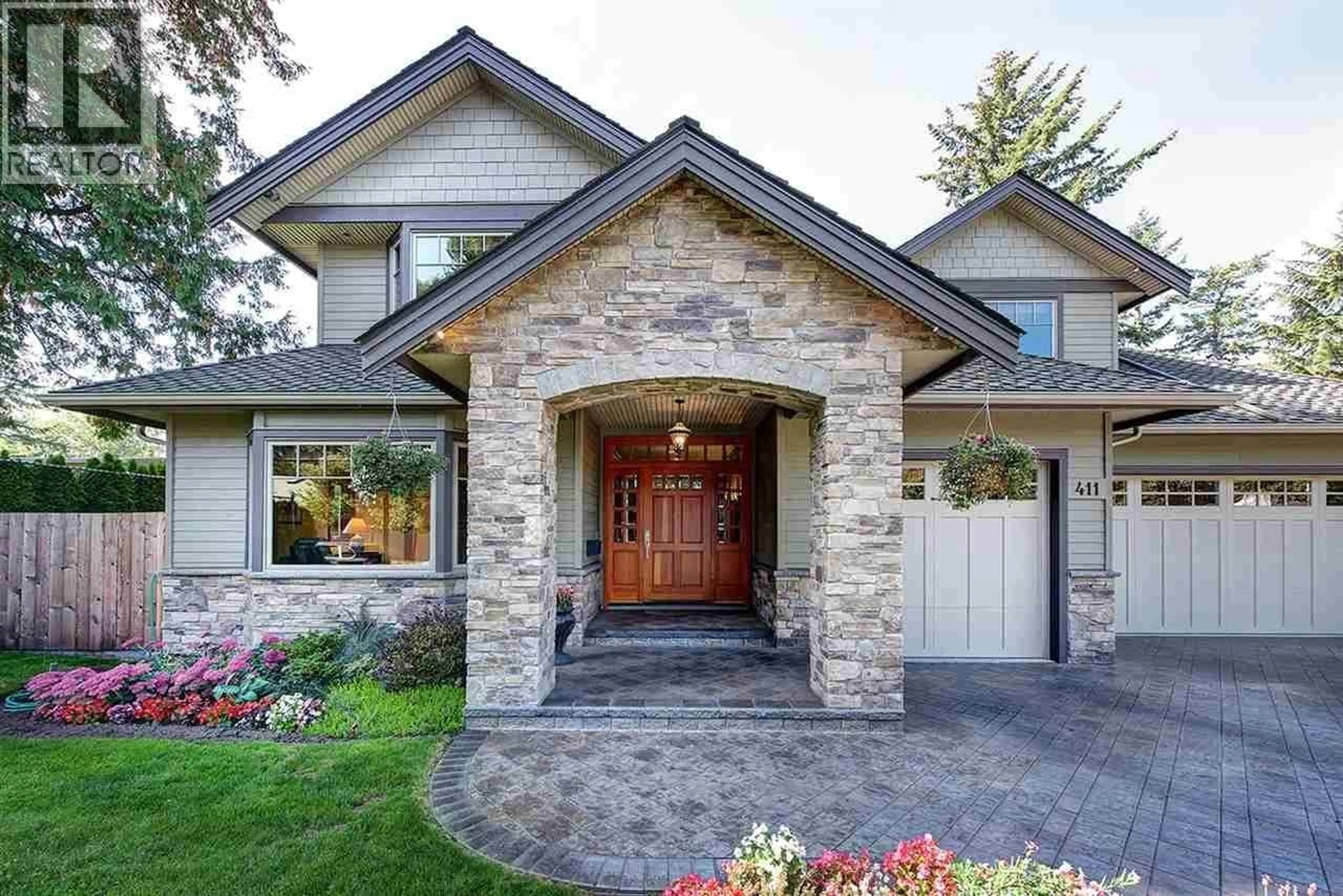 Home with brick exterior material, street for 411 KERRY DRIVE, Delta British Columbia V4M2R1