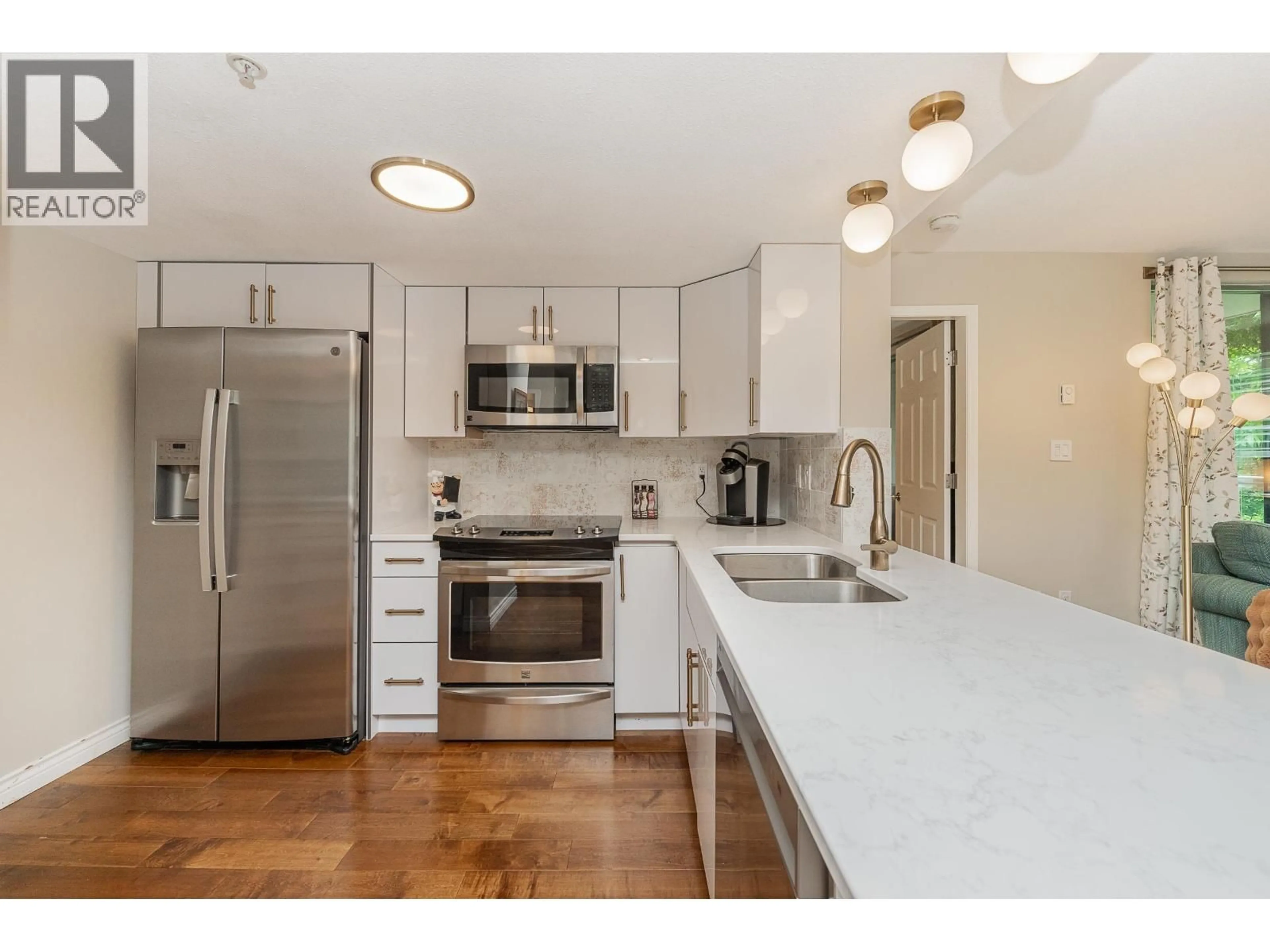 Open concept kitchen, unknown for 304 - 220 NEWPORT DRIVE, Port Moody British Columbia V3H5B8