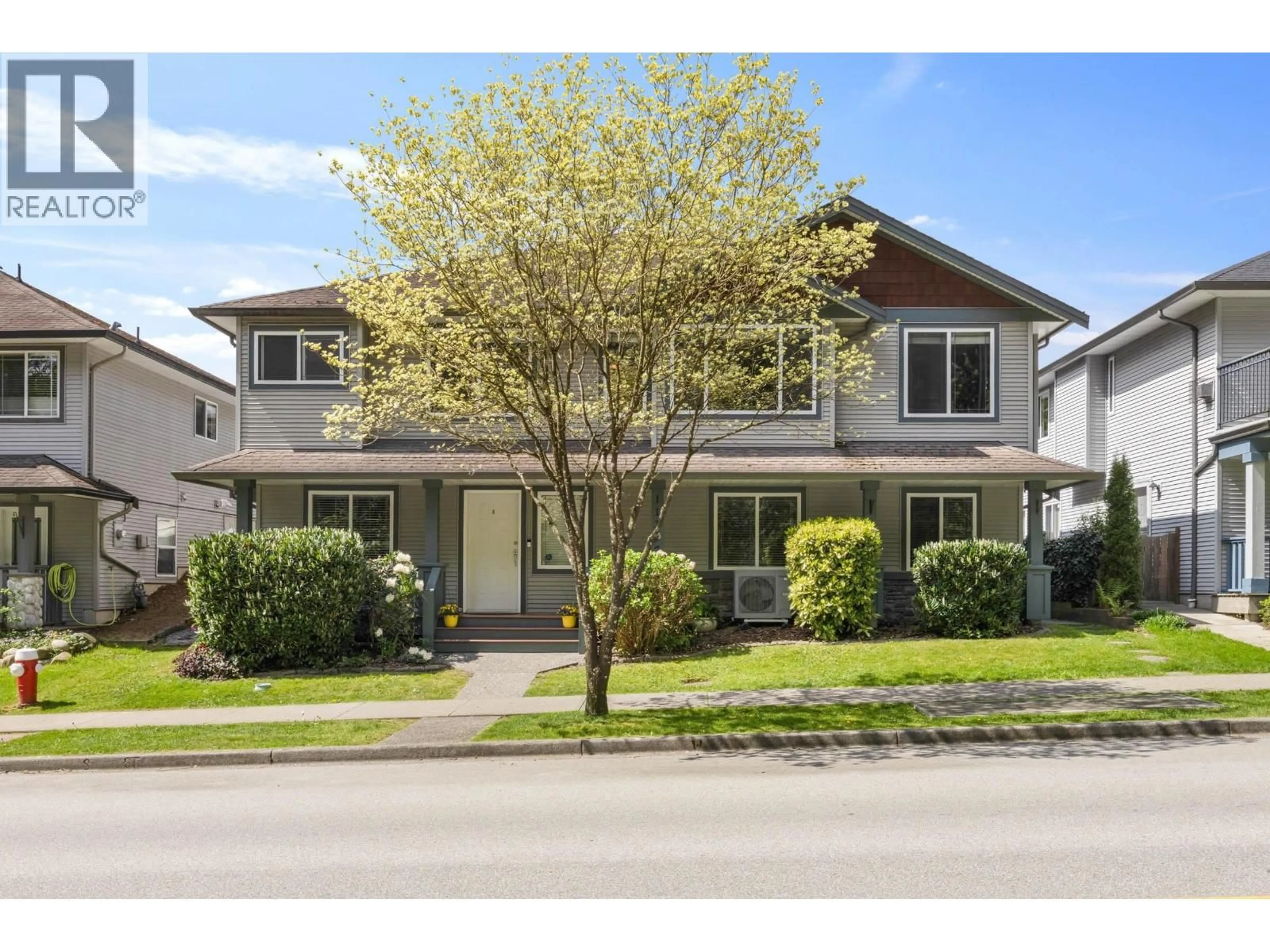 Home with vinyl exterior material, street for 11377 CREEKSIDE STREET, Maple Ridge British Columbia V2W2A4