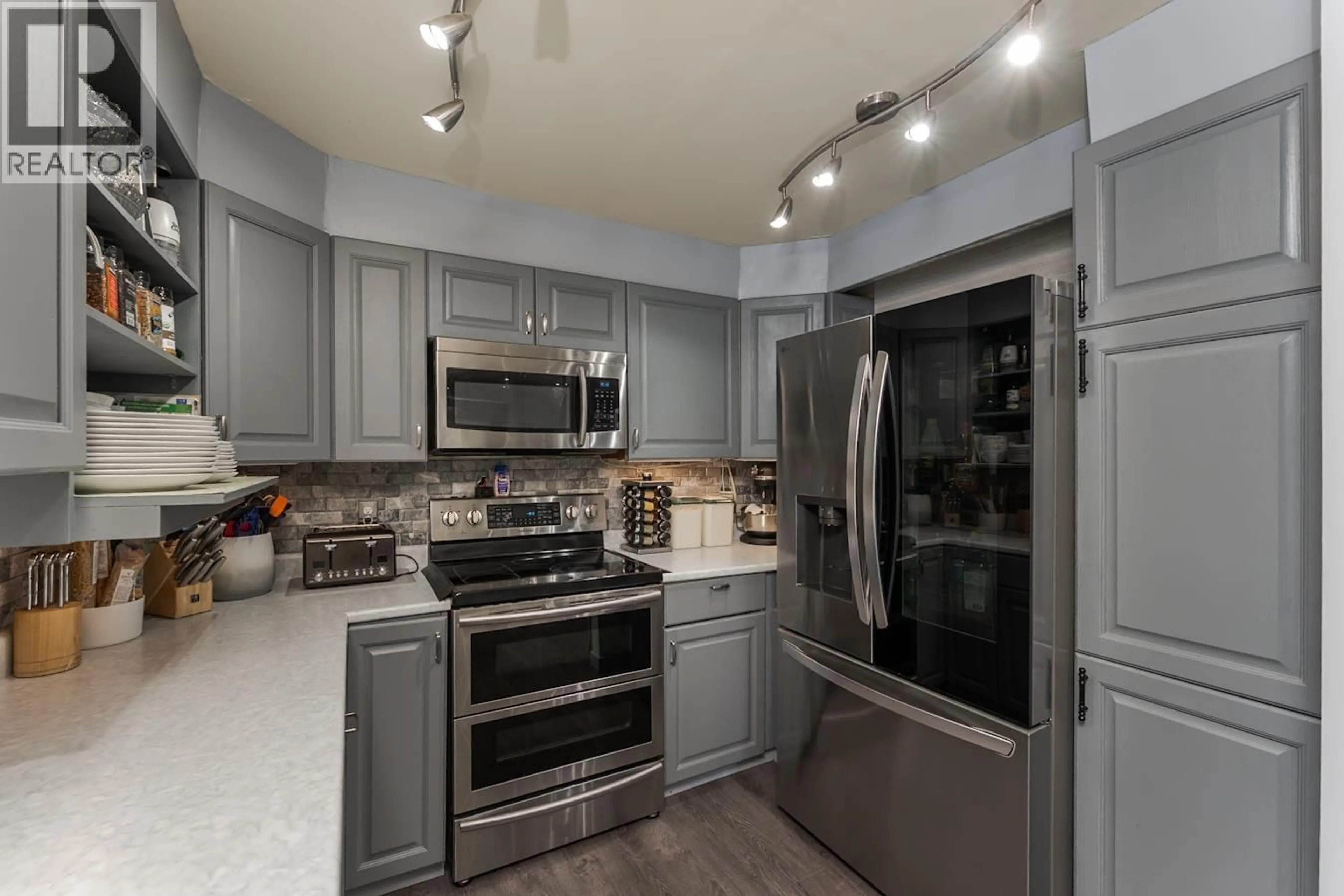 Open concept kitchen, ceramic/tile floor for 7687 SABYAM ROAD, Prince George British Columbia V2K2K4