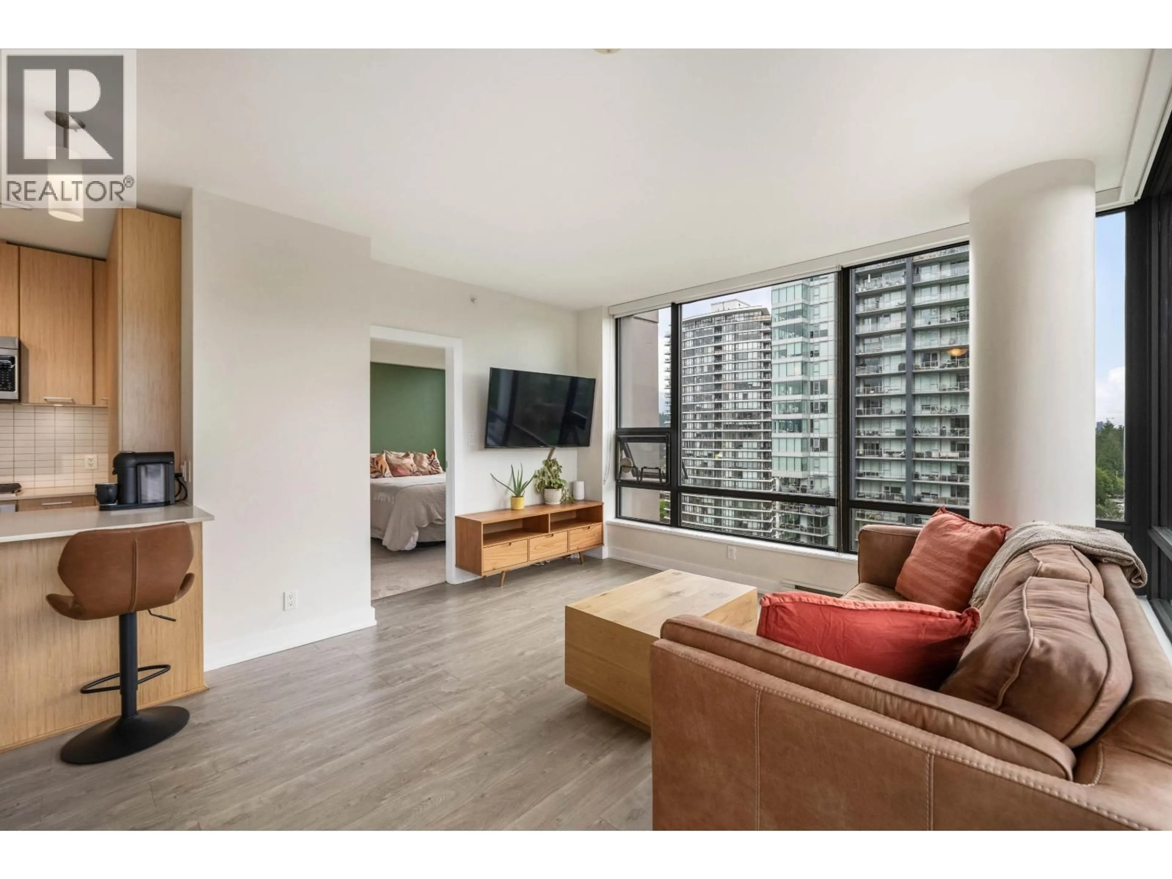 Living room with furniture, wood/laminate floor for 1707 - 301 CAPILANO ROAD, Port Moody British Columbia V3H0G6