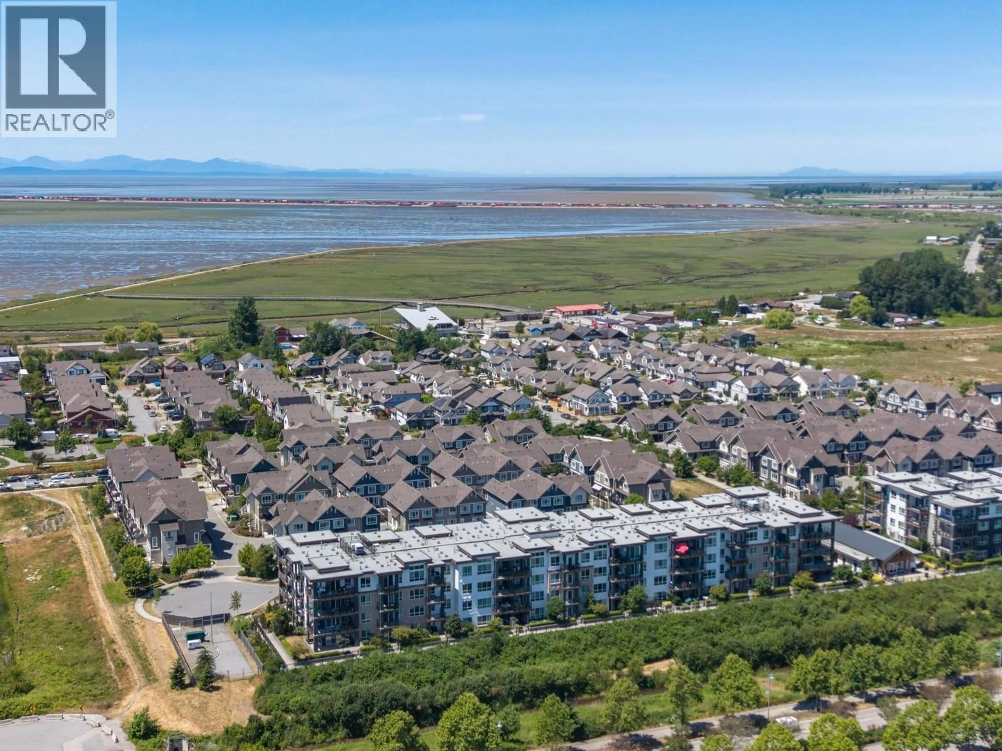 A pic from outside/outdoor area/front of a property/back of a property/a pic from drone, water/lake/river/ocean view for 413 - 1792 STARLING DRIVE, Tsawwassen British Columbia V4M0E4
