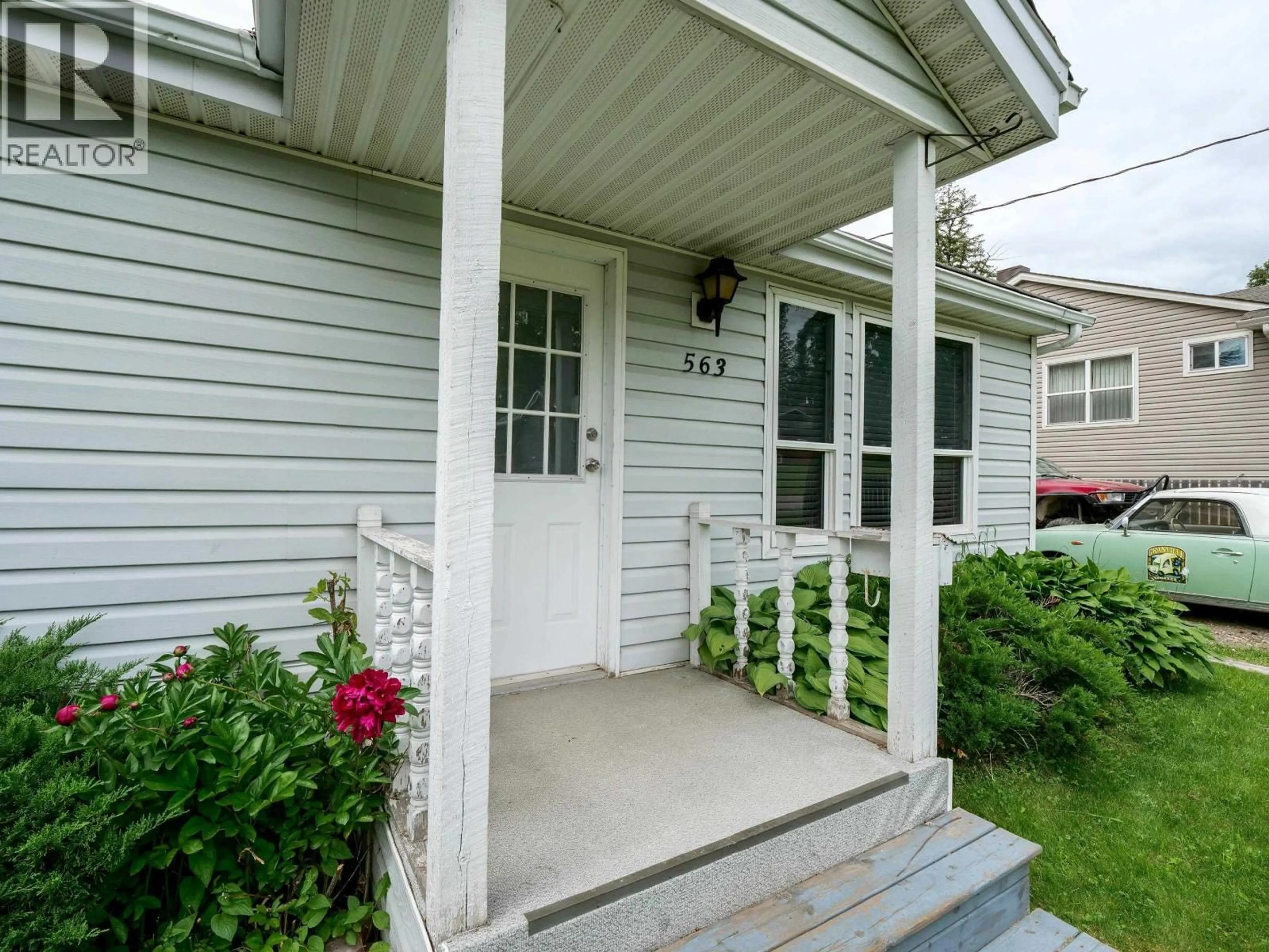Home with vinyl exterior material, street for 563 JONES STREET, Quesnel British Columbia V2J2X2
