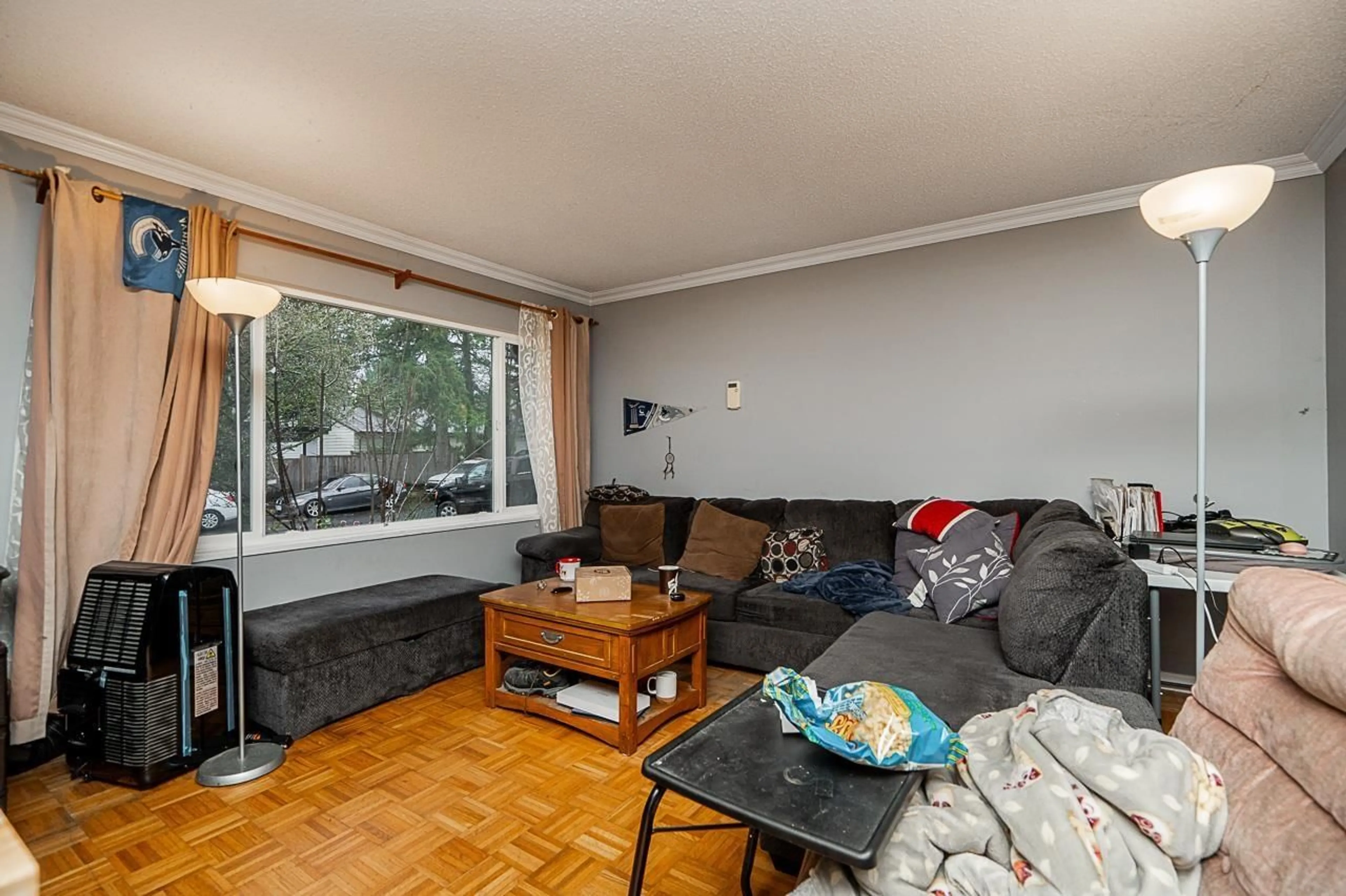 Living room with furniture, wood/laminate floor for 6666 133B STREET, Surrey British Columbia V3W7E9