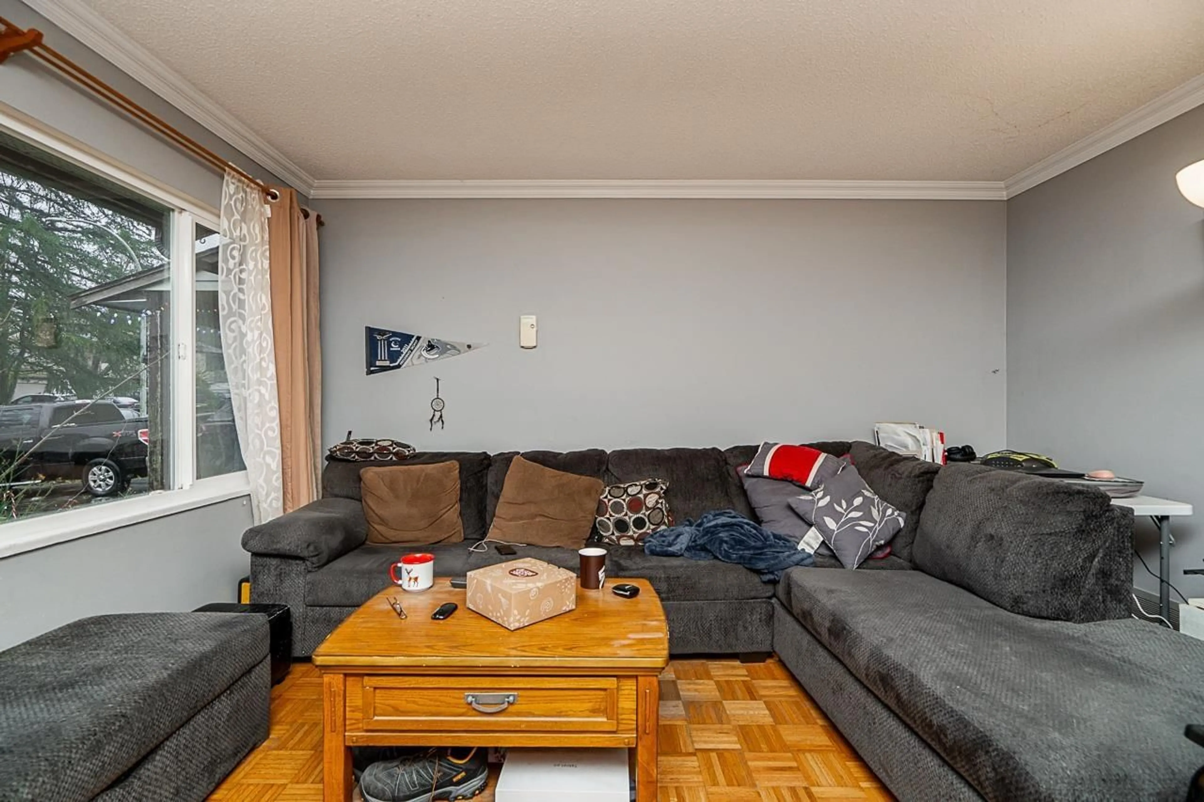 Living room with furniture, wood/laminate floor for 6666 133B STREET, Surrey British Columbia V3W7E9