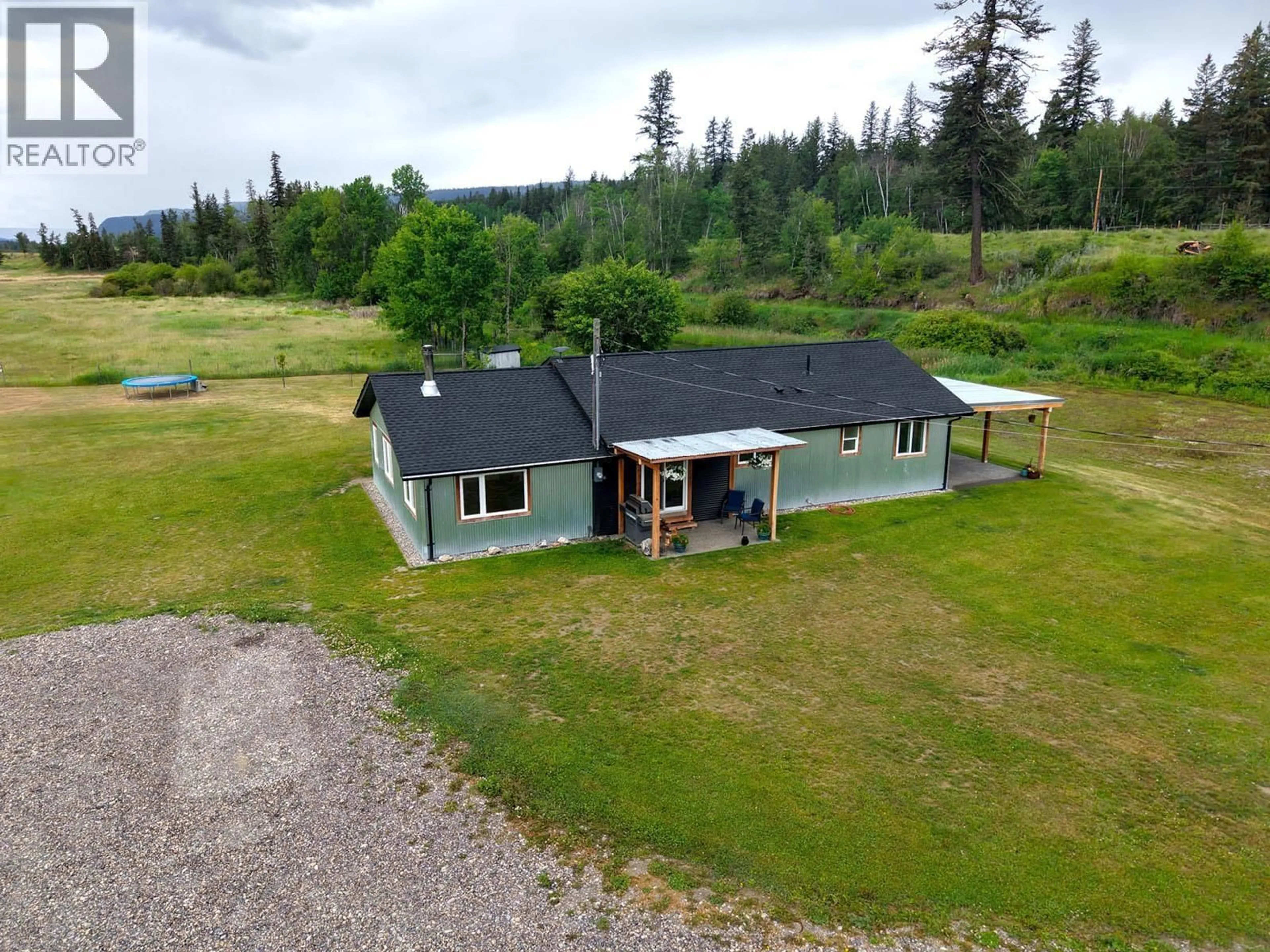 A pic from outside/outdoor area/front of a property/back of a property/a pic from drone, building for 9811 MARGUERITE FERRY ROAD, Quesnel British Columbia V2J6R6
