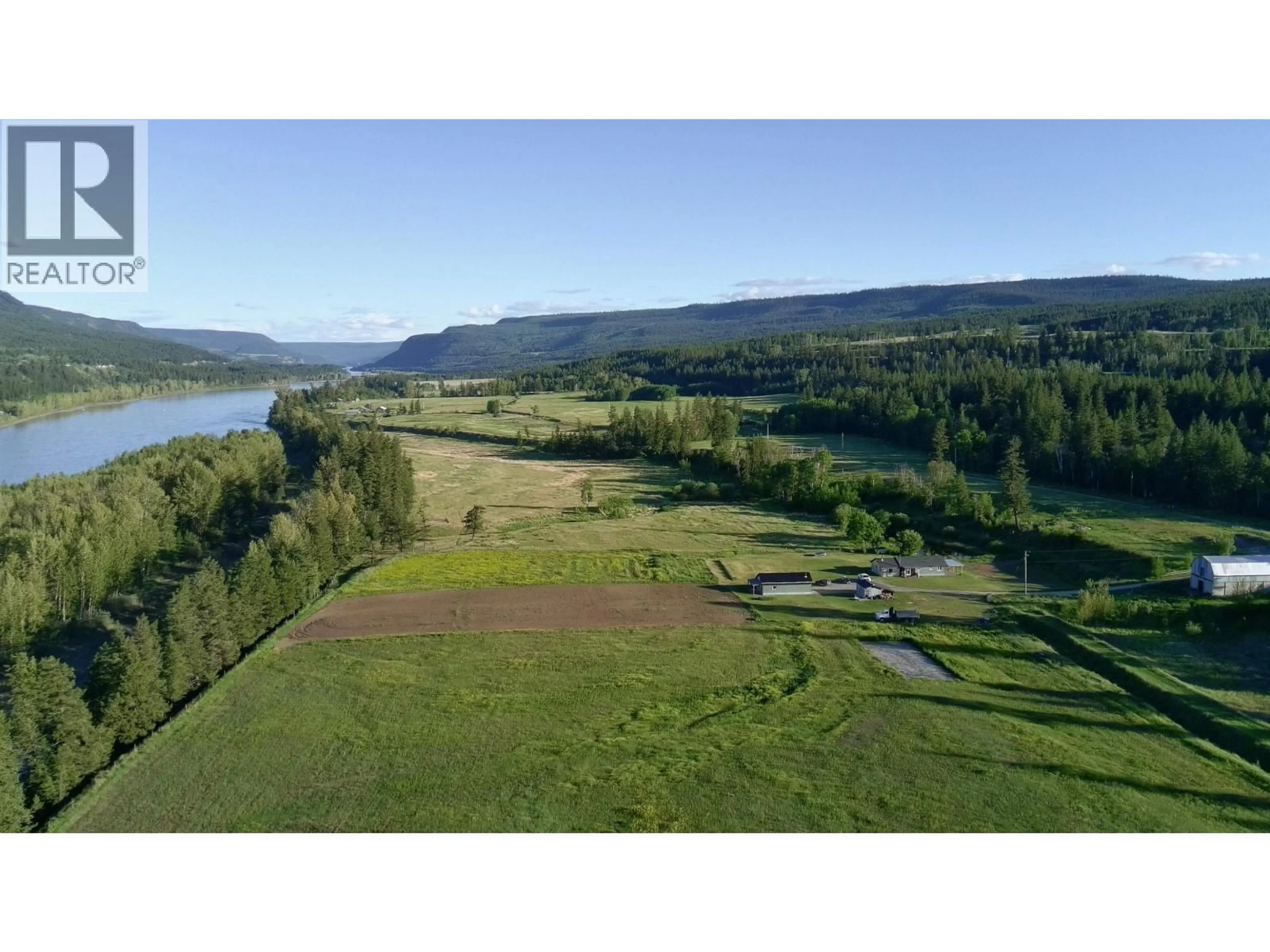 A pic from outside/outdoor area/front of a property/back of a property/a pic from drone, water/lake/river/ocean view for 9811 MARGUERITE FERRY ROAD, Quesnel British Columbia V2J6R6