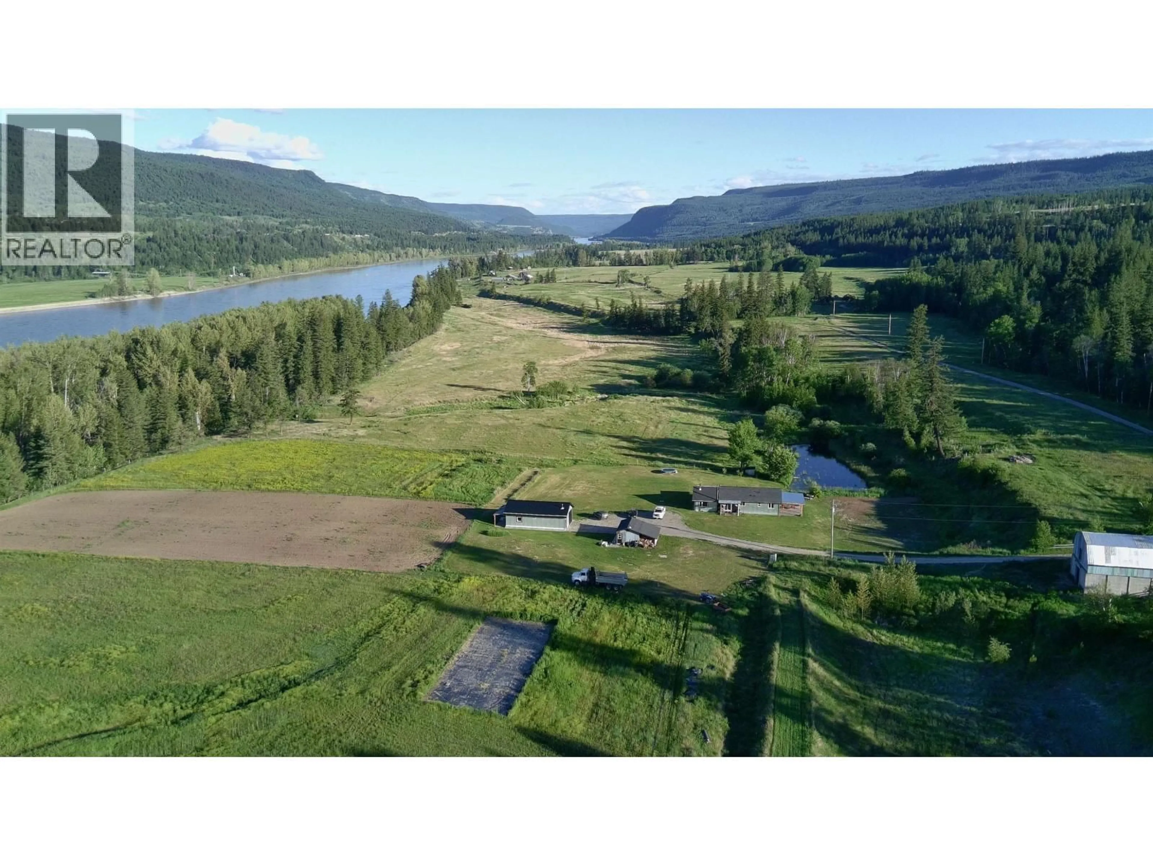 A pic from outside/outdoor area/front of a property/back of a property/a pic from drone, water/lake/river/ocean view for 9811 MARGUERITE FERRY ROAD, Quesnel British Columbia V2J6R6