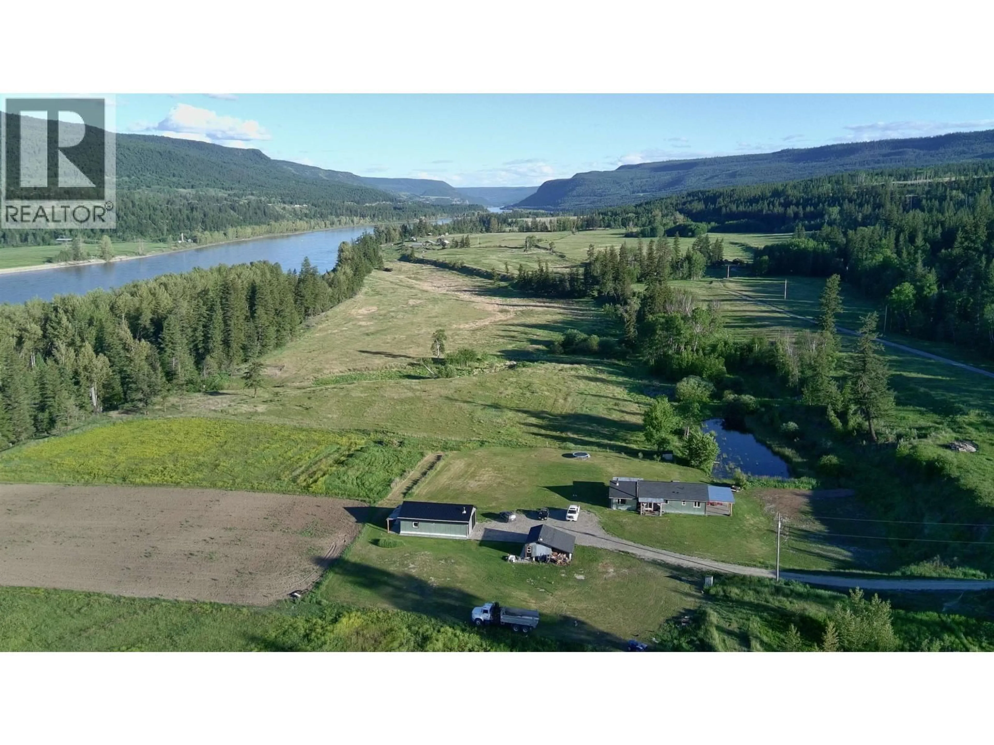 A pic from outside/outdoor area/front of a property/back of a property/a pic from drone, water/lake/river/ocean view for 9811 MARGUERITE FERRY ROAD, Quesnel British Columbia V2J6R6